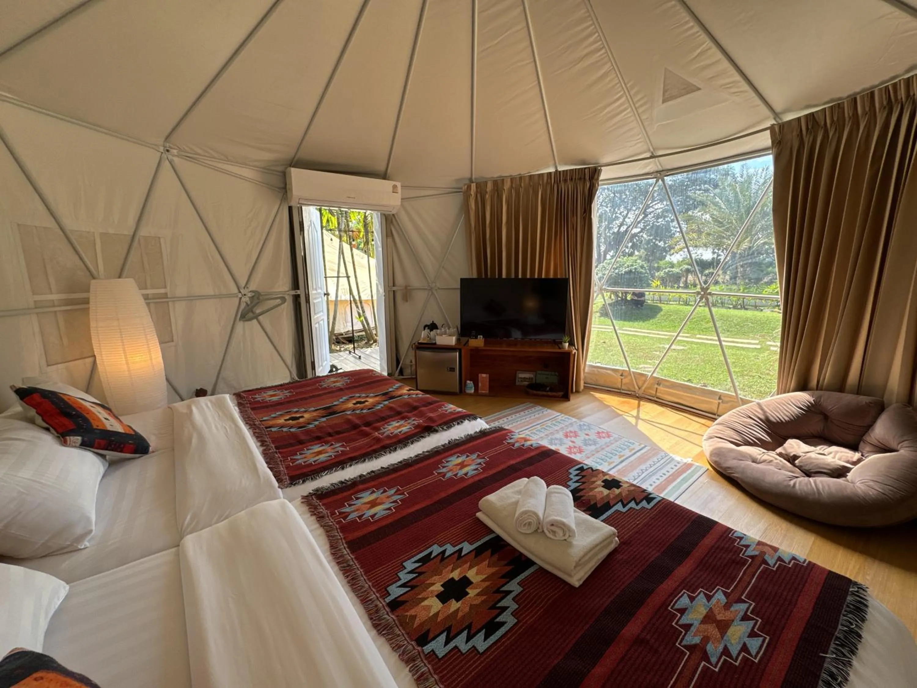 Bed in The Campster Kanchanaburi