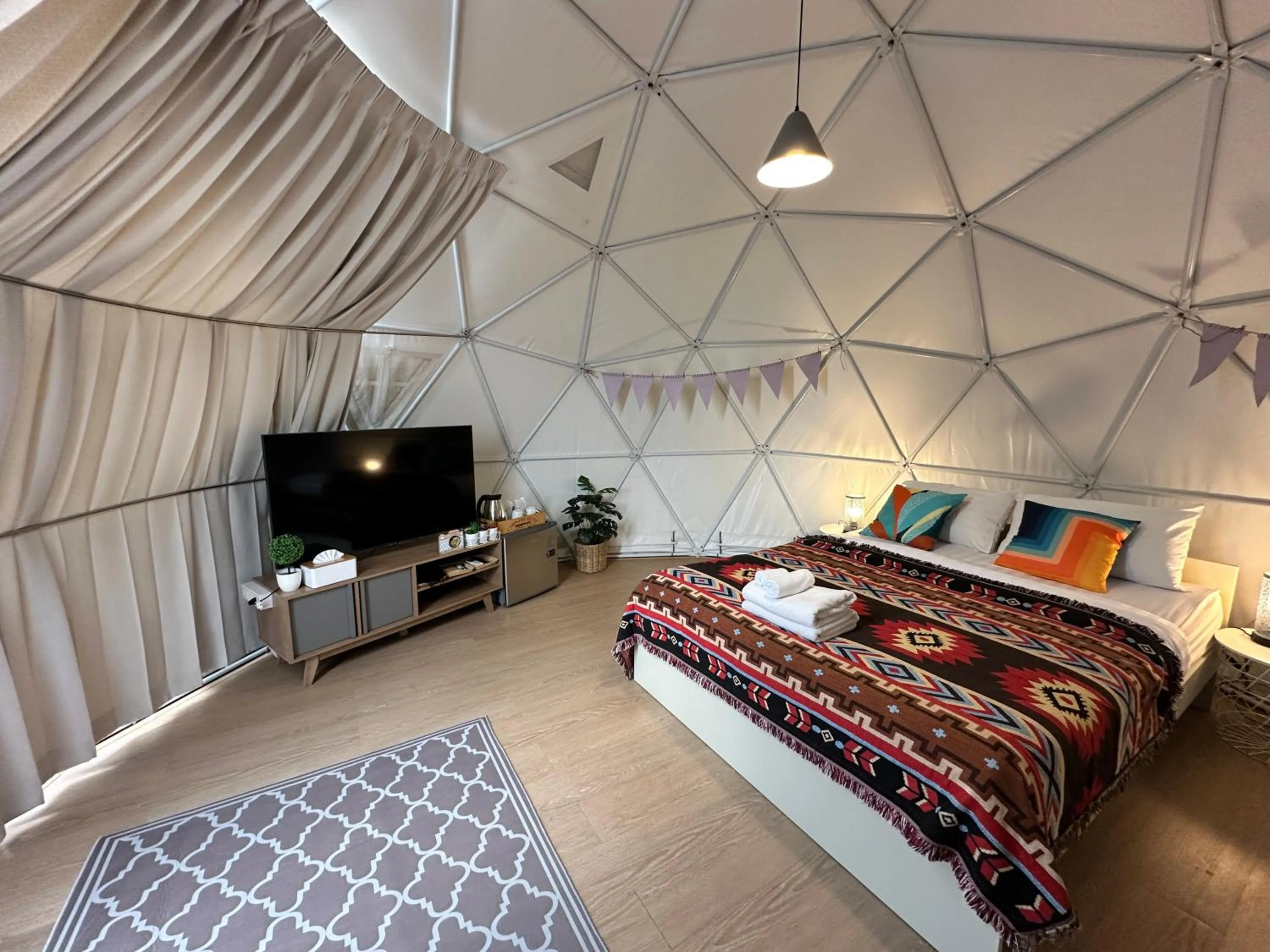 Bed in The Campster Kanchanaburi