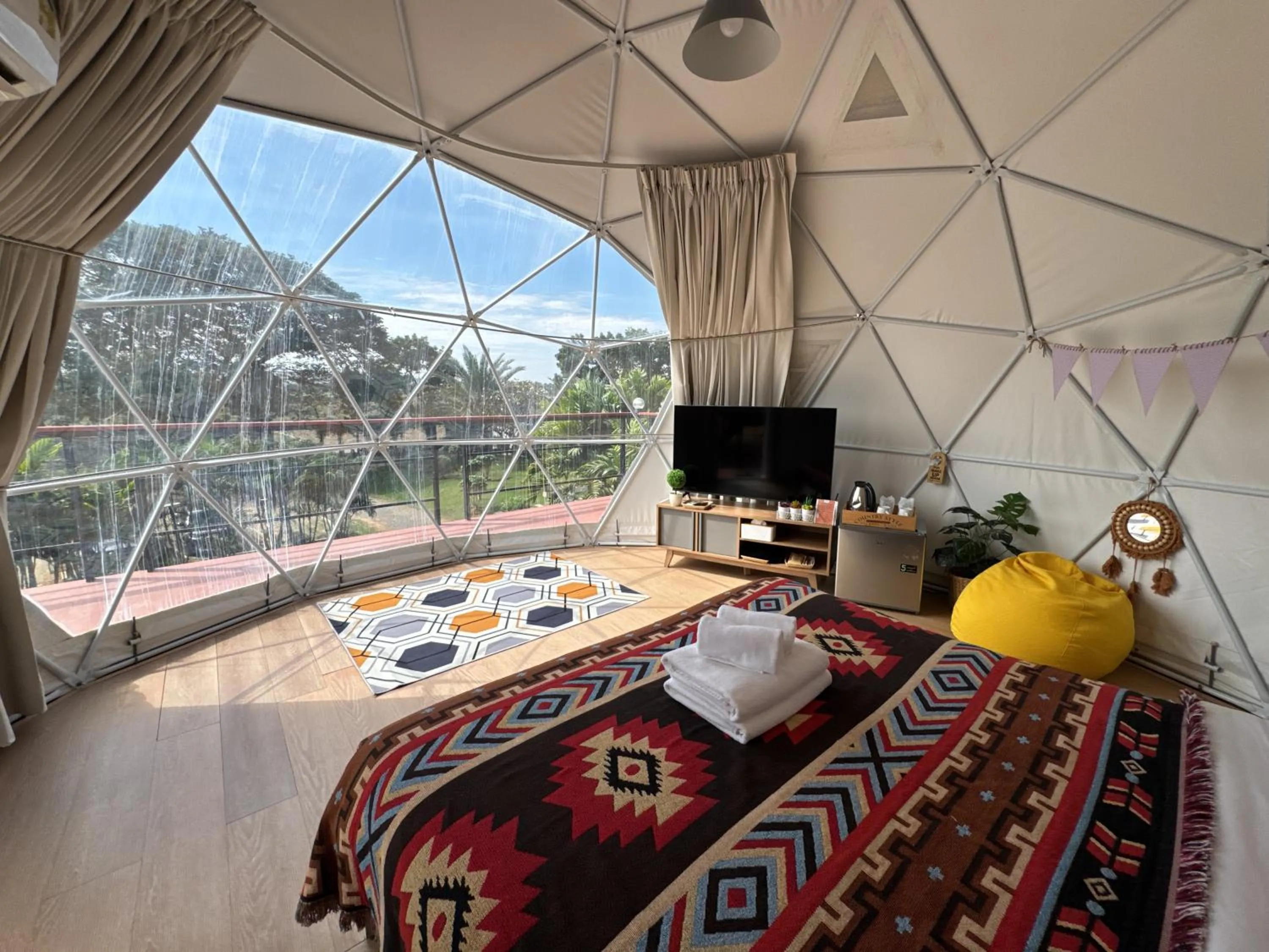 Bed in The Campster Kanchanaburi