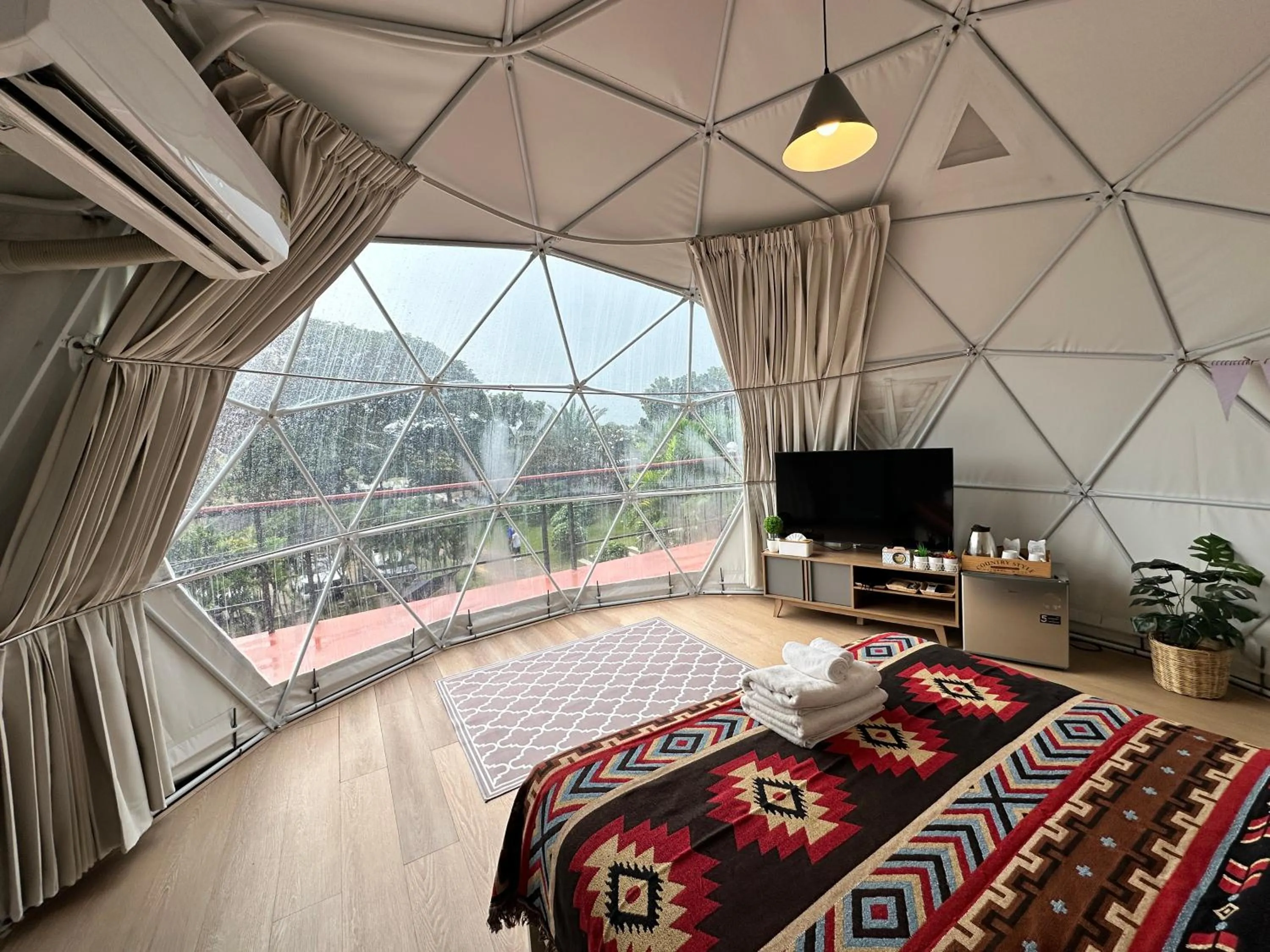 Bed in The Campster Kanchanaburi