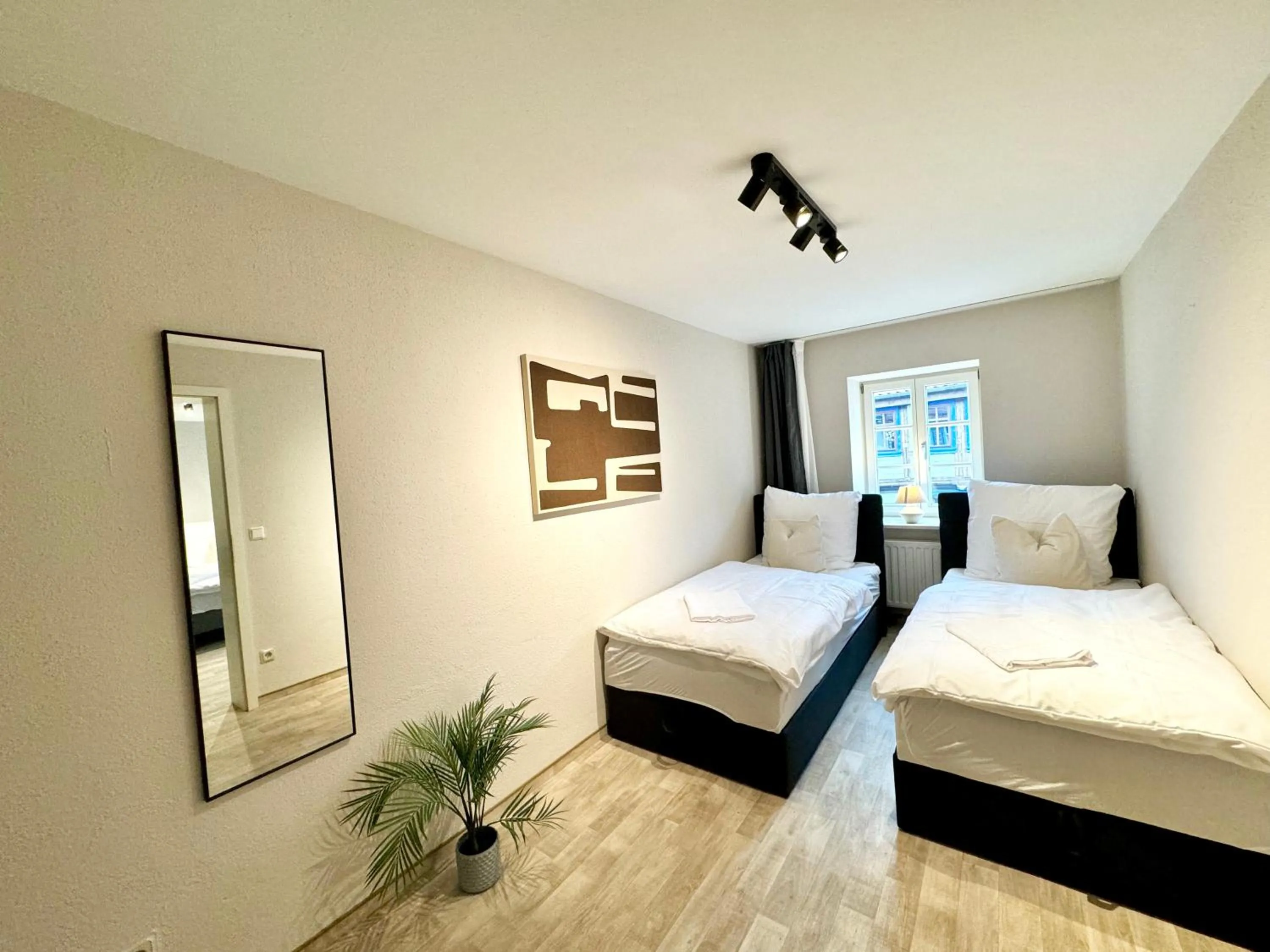 Bed in gina stay - Apartmenthaus im Zentrum von Quedlinburg
