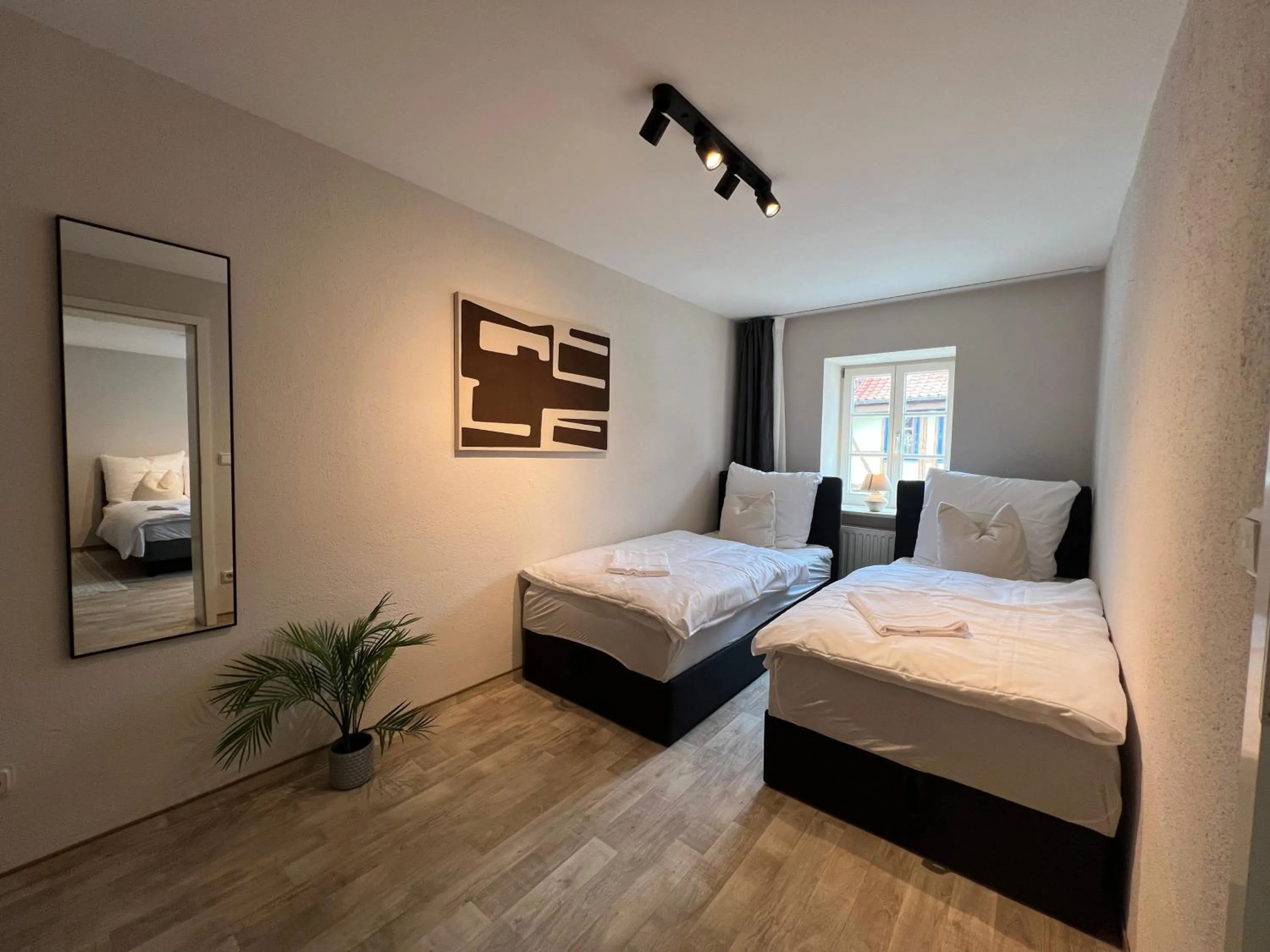 Bed in gina stay - Apartmenthaus im Zentrum von Quedlinburg