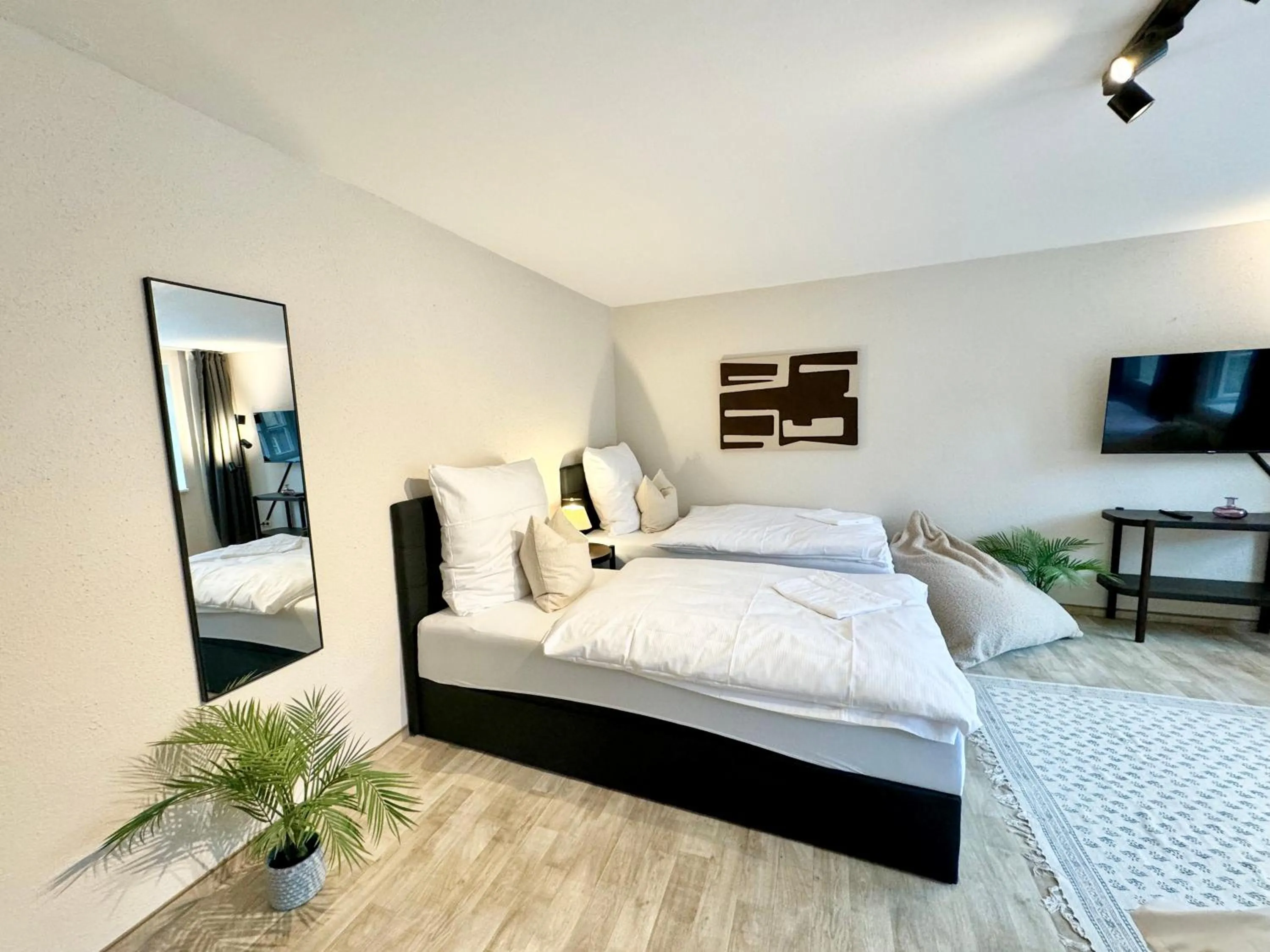 Bed in gina stay - Apartmenthaus im Zentrum von Quedlinburg