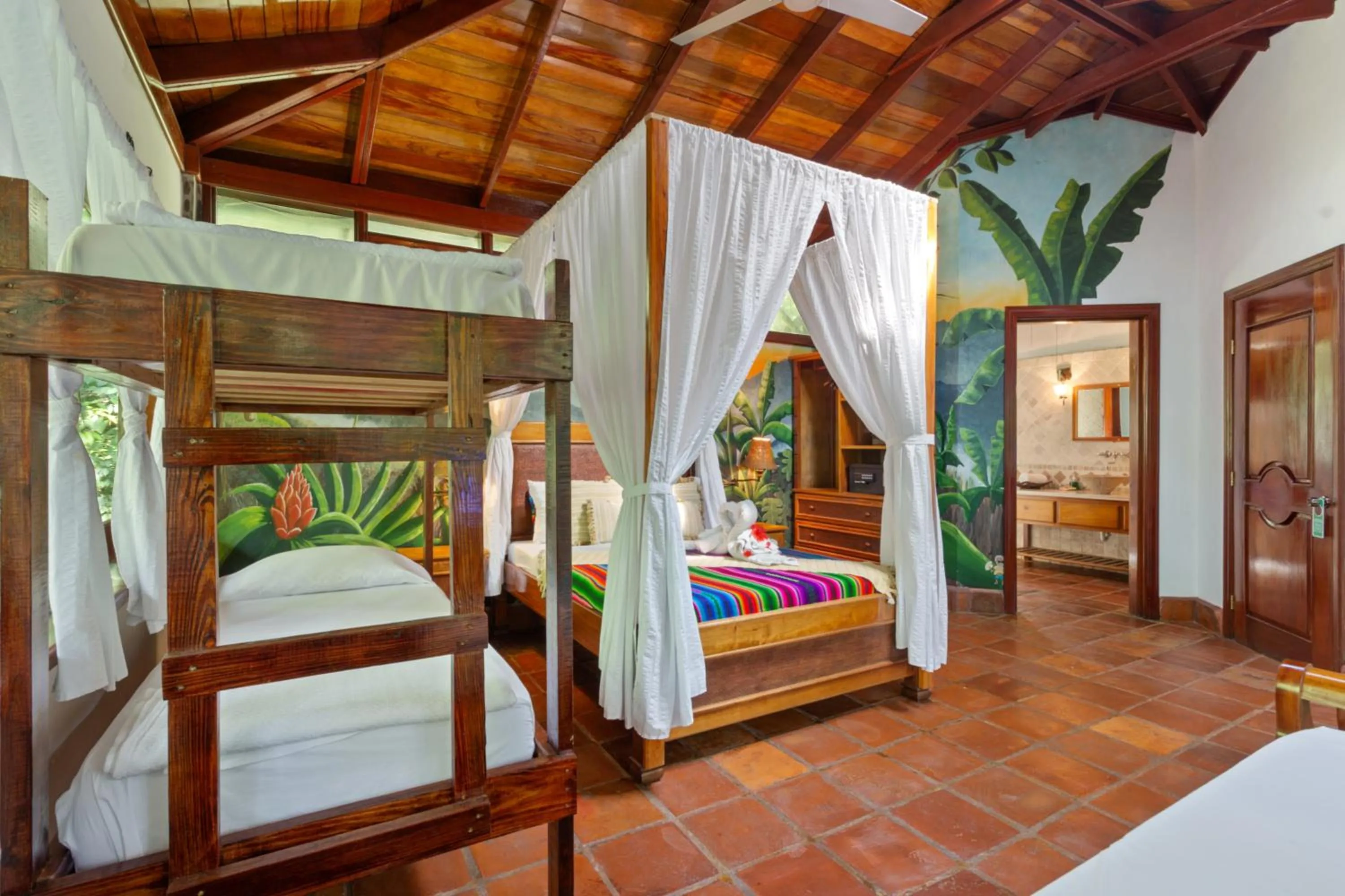Photo of the whole room, Bed in Ian Anderson Caves Branch Jungle Lodge