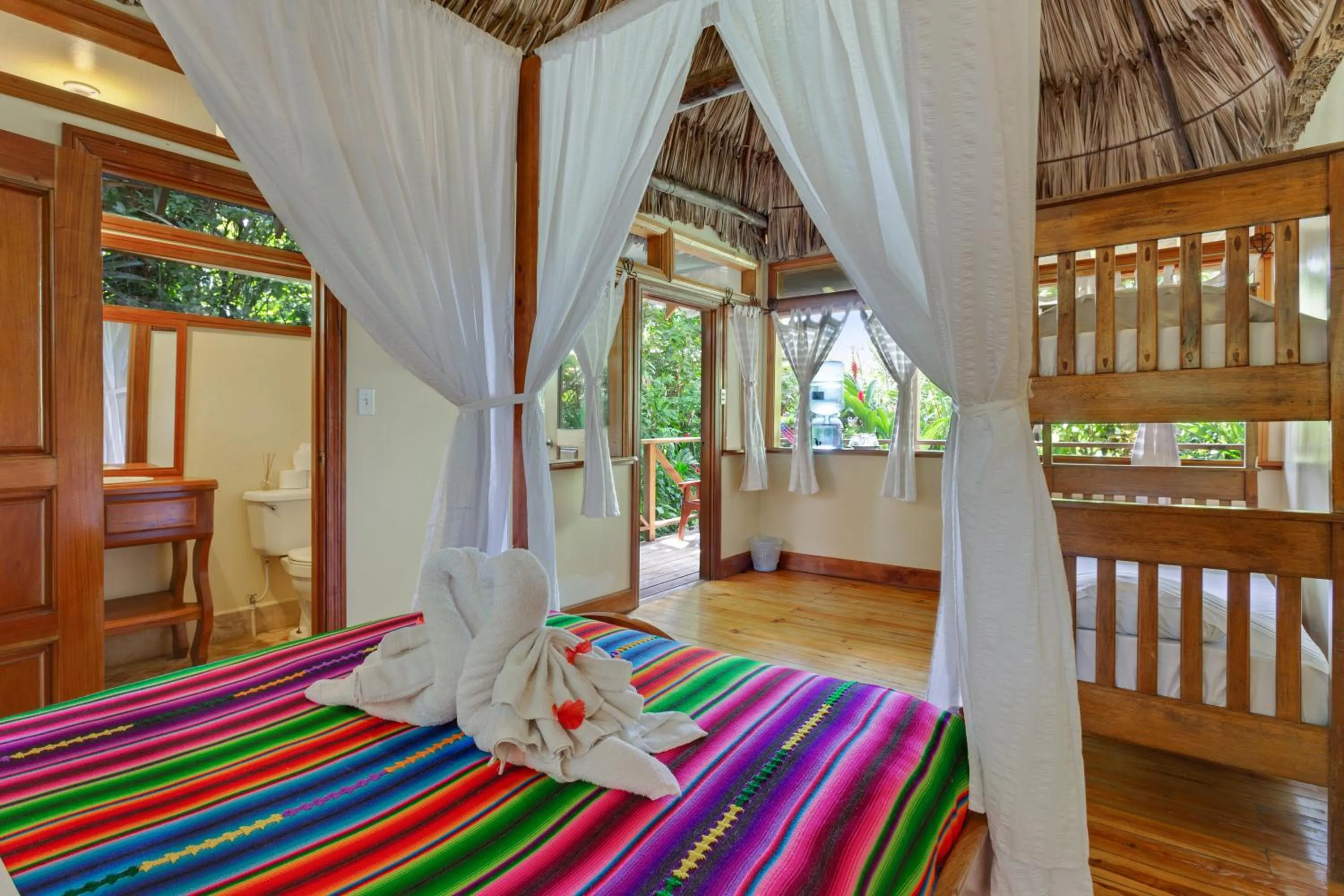 Photo of the whole room, Bed in Ian Anderson Caves Branch Jungle Lodge