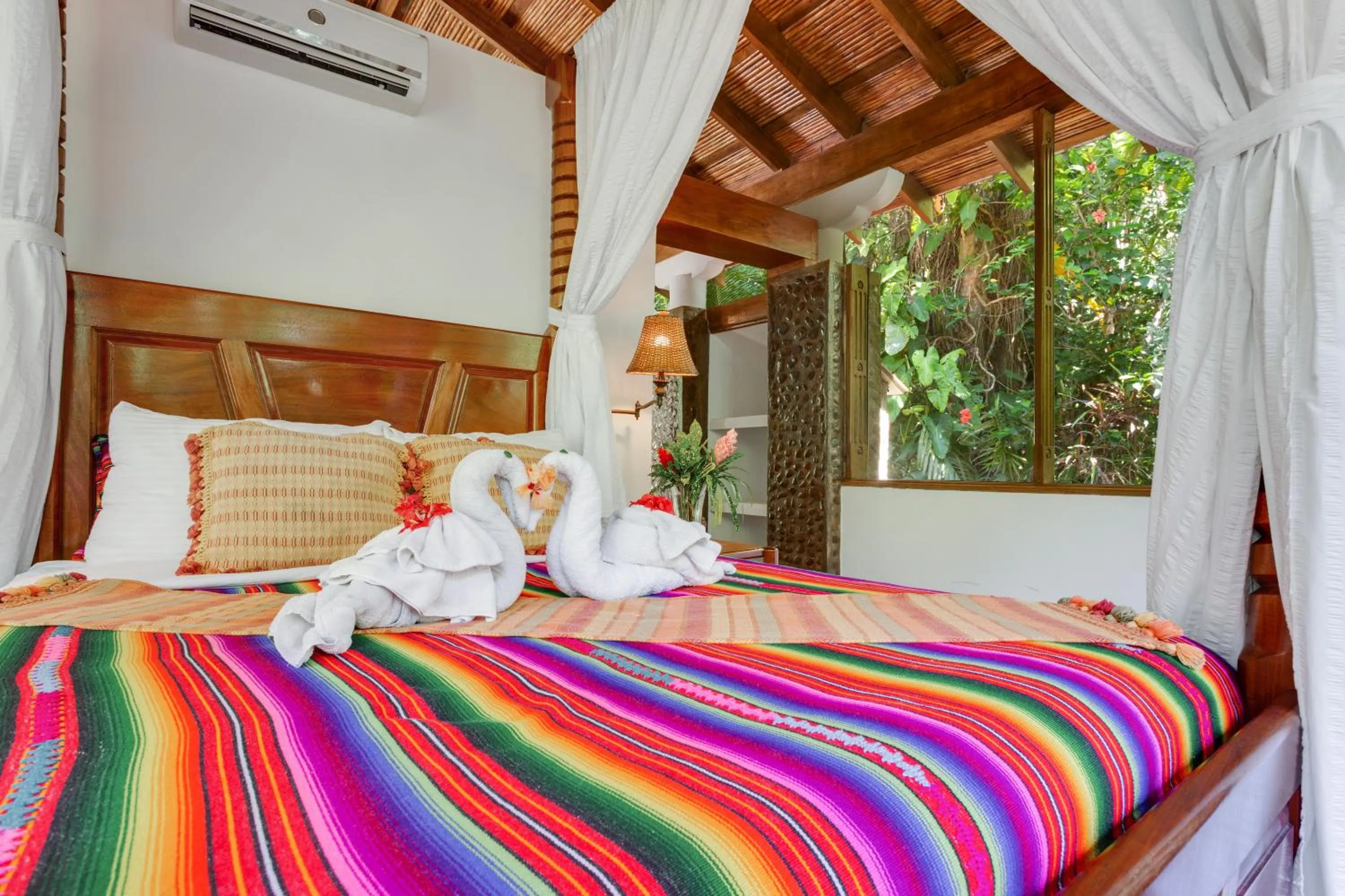 Photo of the whole room, Bed in Ian Anderson Caves Branch Jungle Lodge