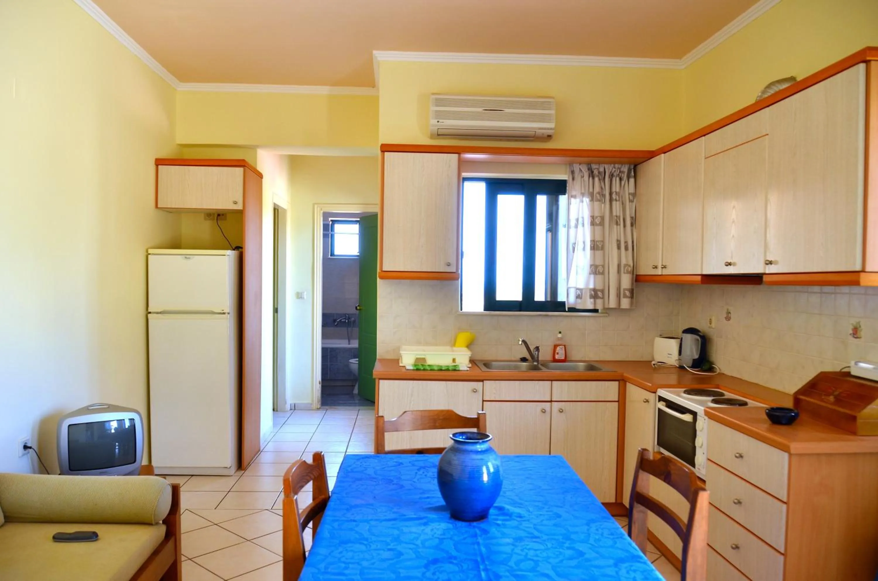 Kitchen or kitchenette in Aloni Suites
