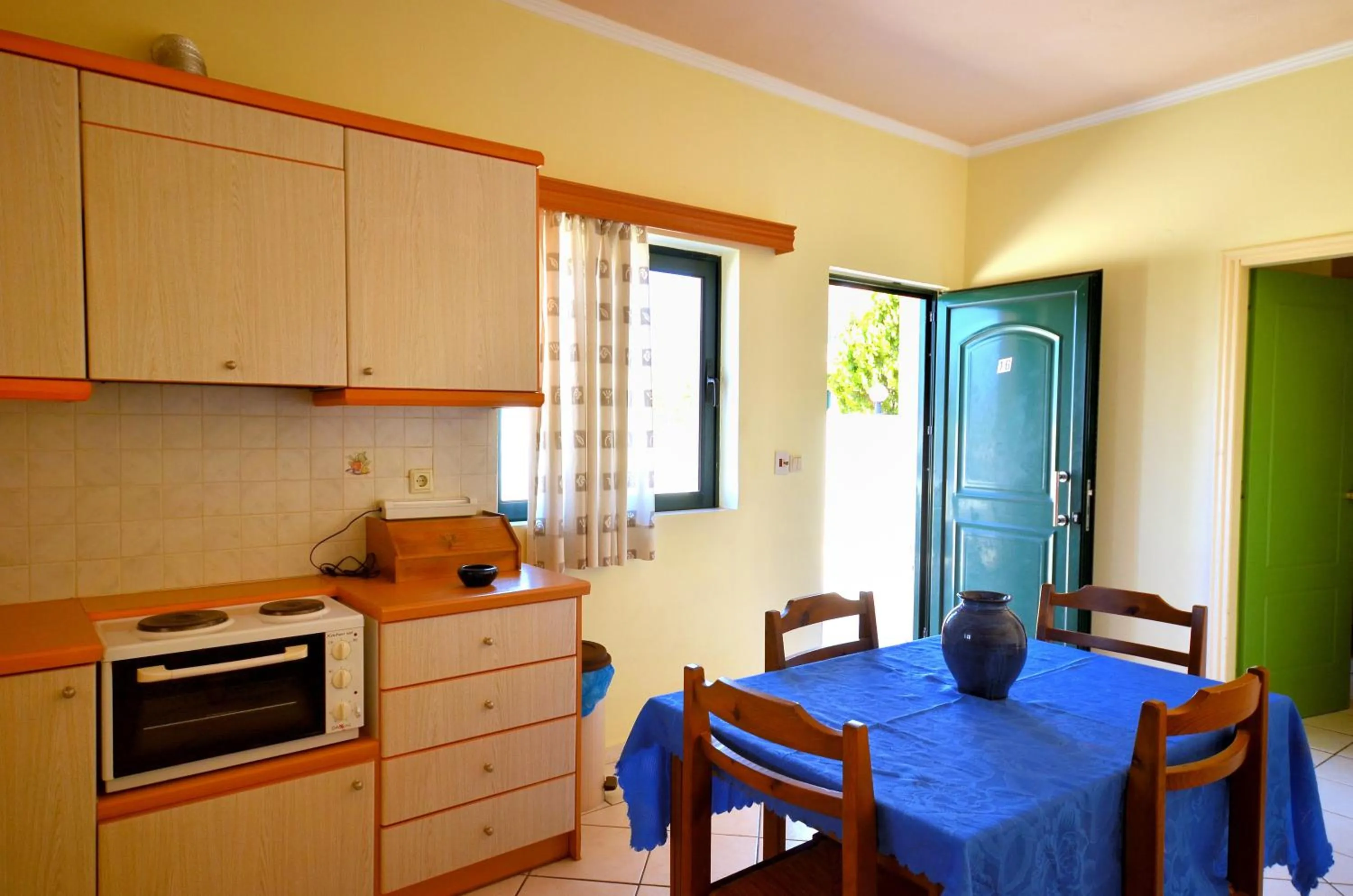 Kitchen or kitchenette in Aloni Suites