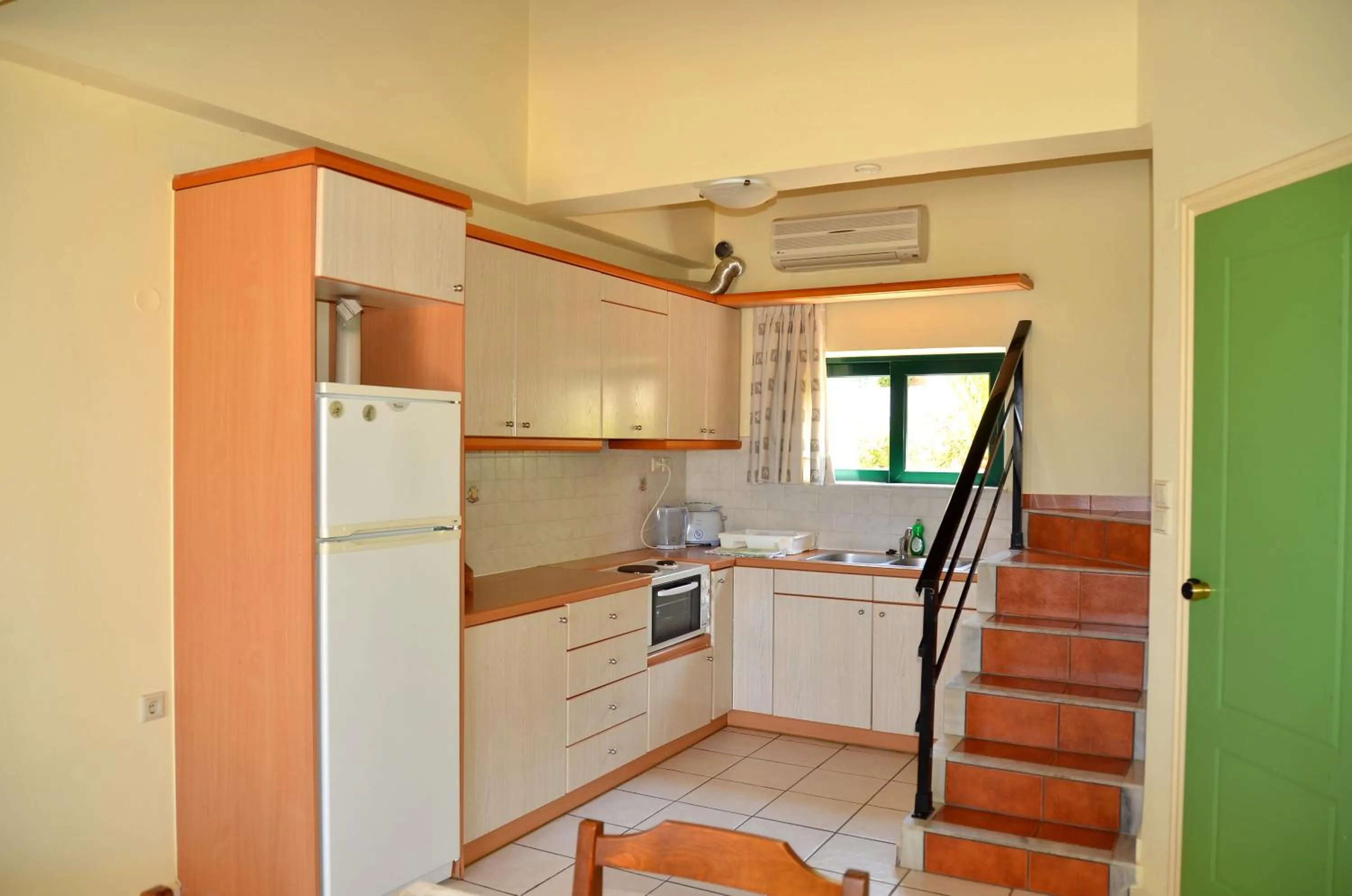 Kitchen or kitchenette in Aloni Suites
