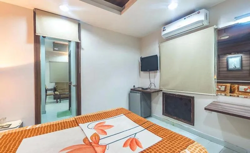 Bed in Hotel Tara International