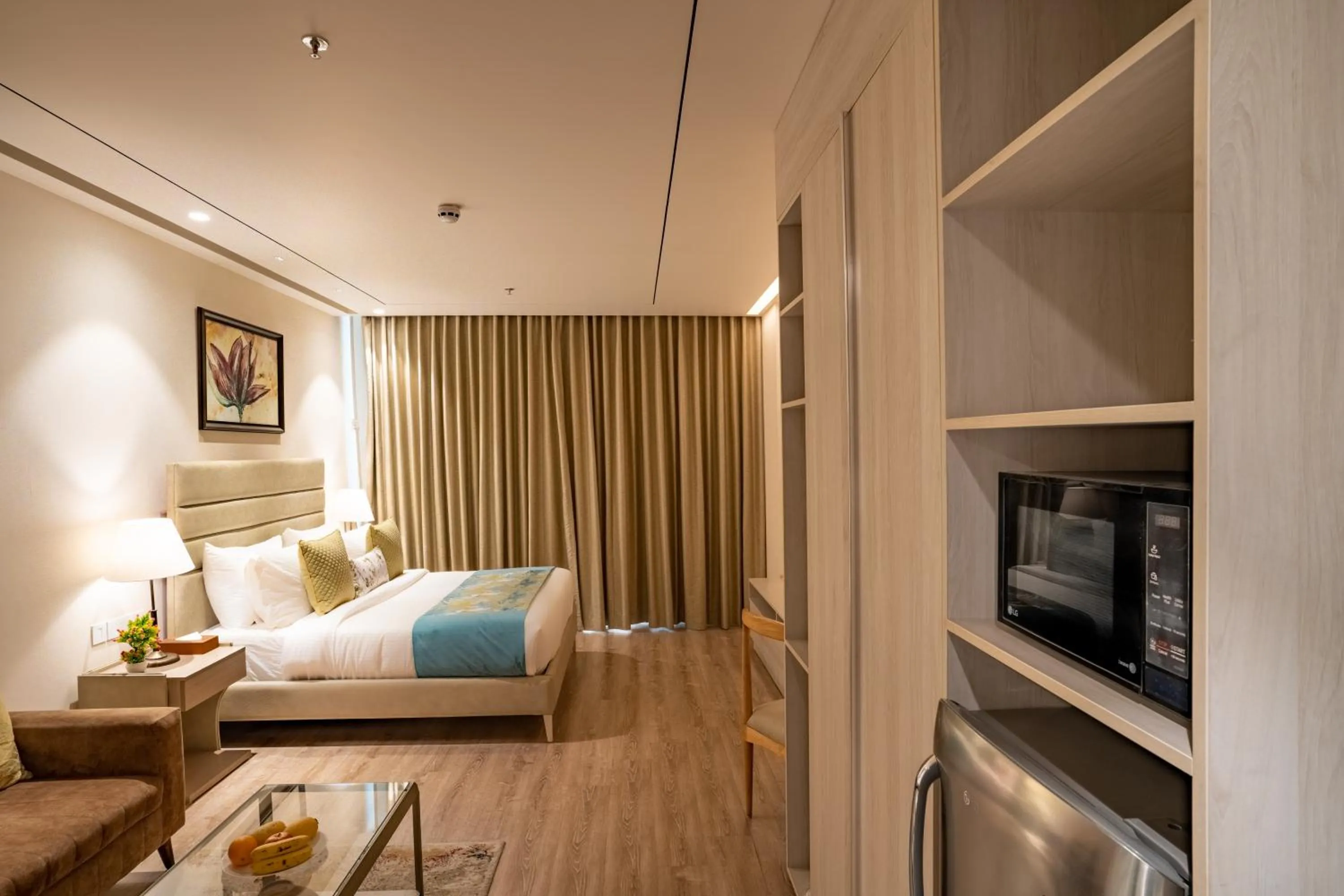 Bedroom, Bed in jüSTa Residences - AIPL Joy Street, Gurgaon