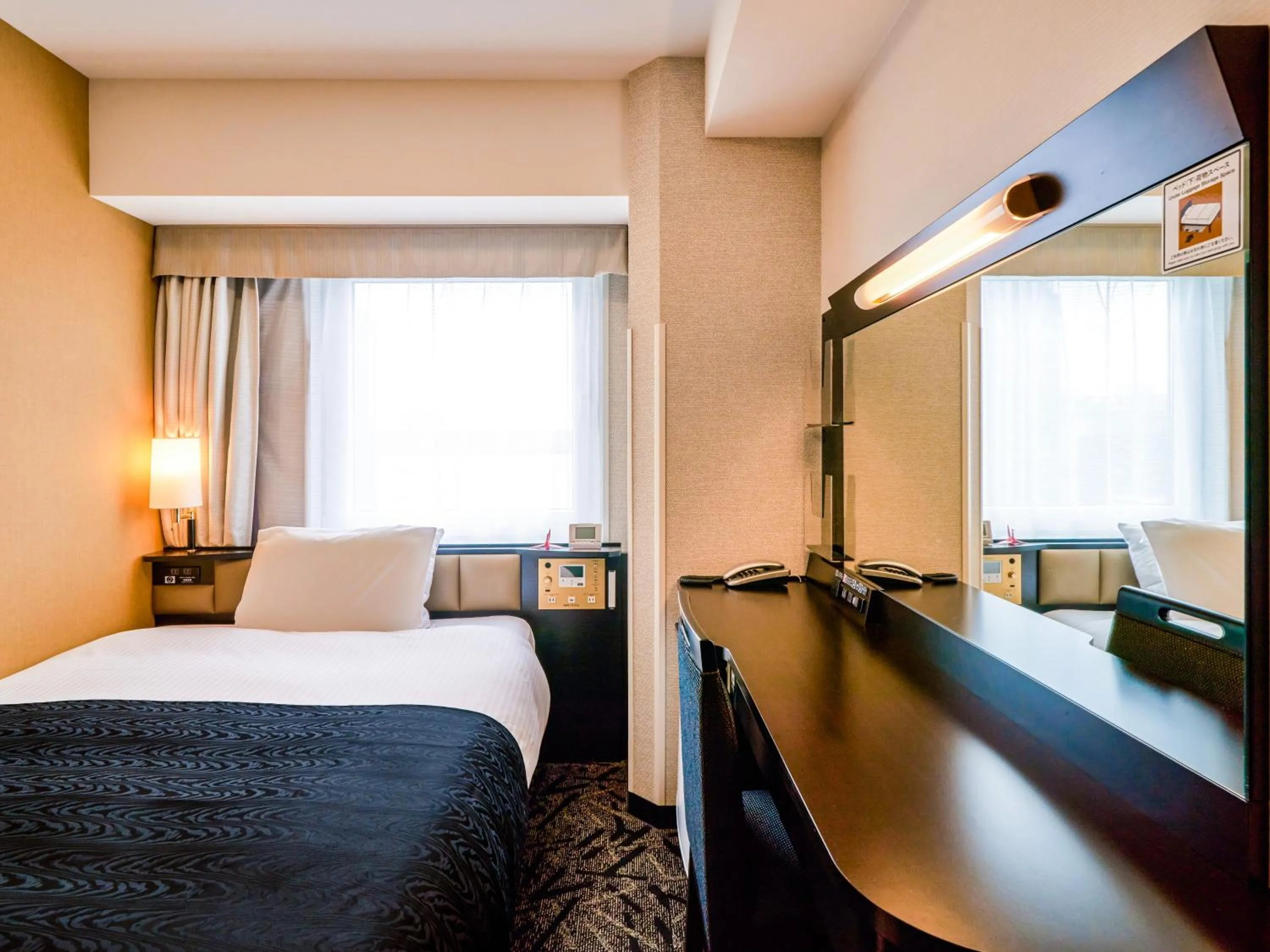 Photo of the whole room, Bed in APA Hotel Hiroshima Ekimae Shinkansenguchi