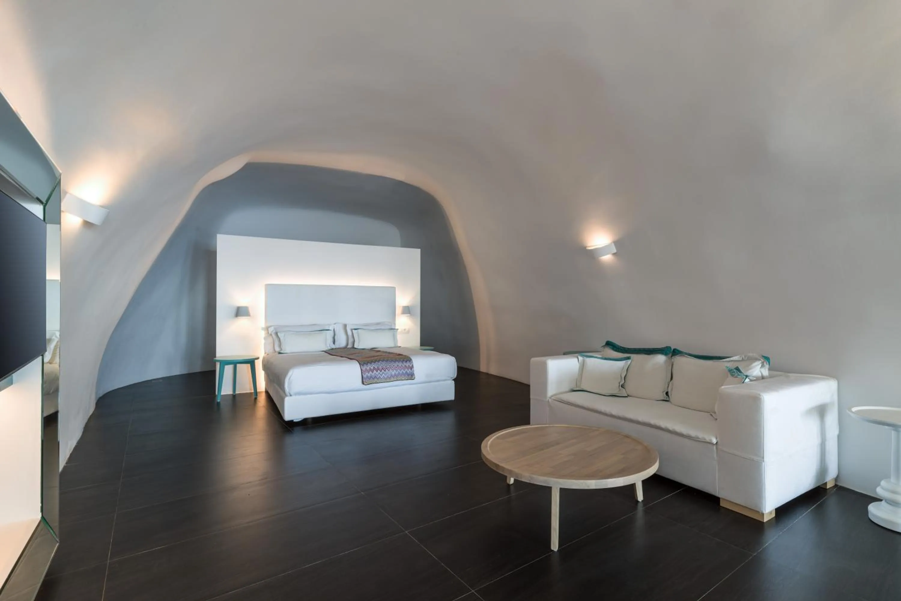 Bed in Katikies Chromata Santorini - The Leading Hotels of the World