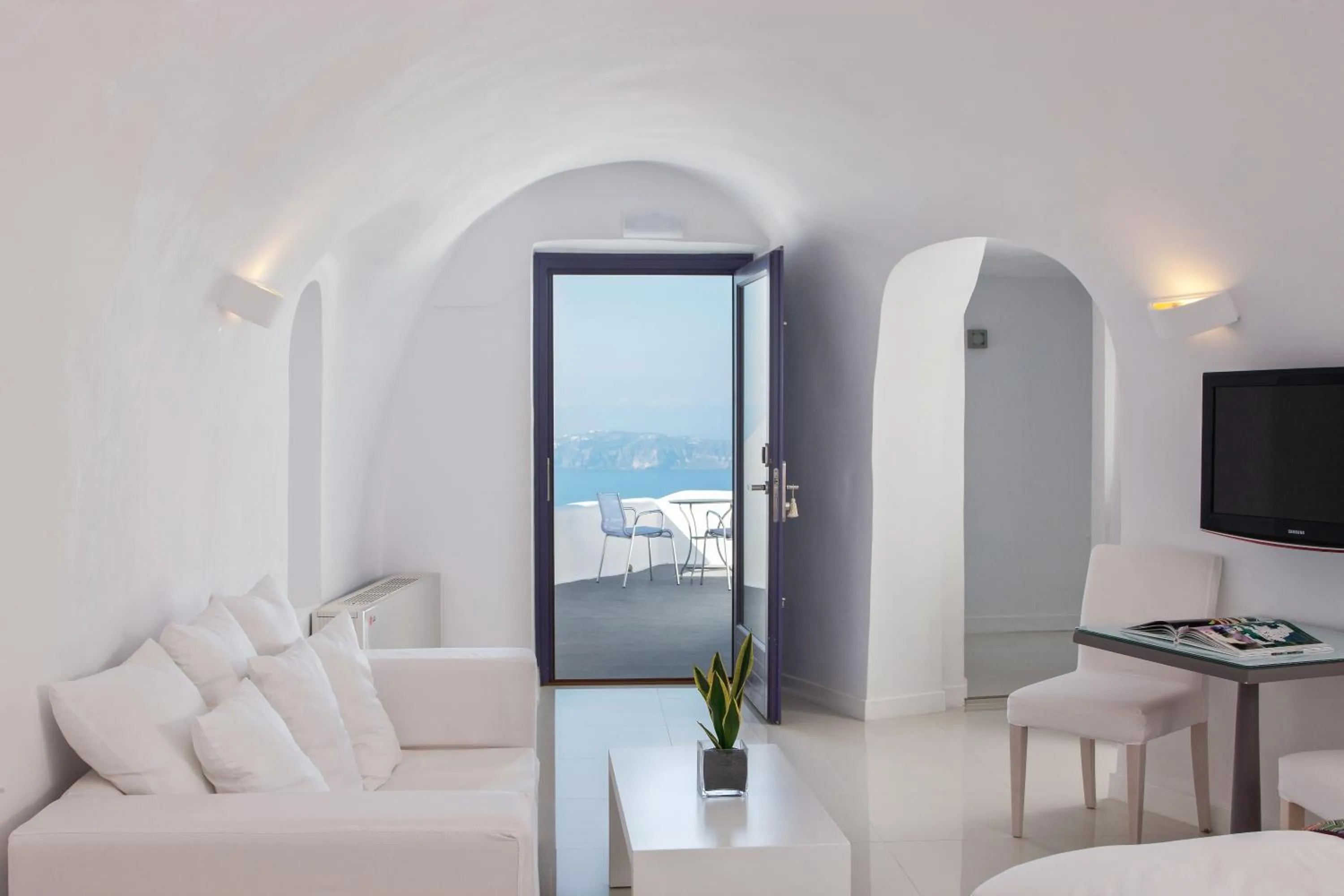 Seating area in Katikies Chromata Santorini - The Leading Hotels of the World