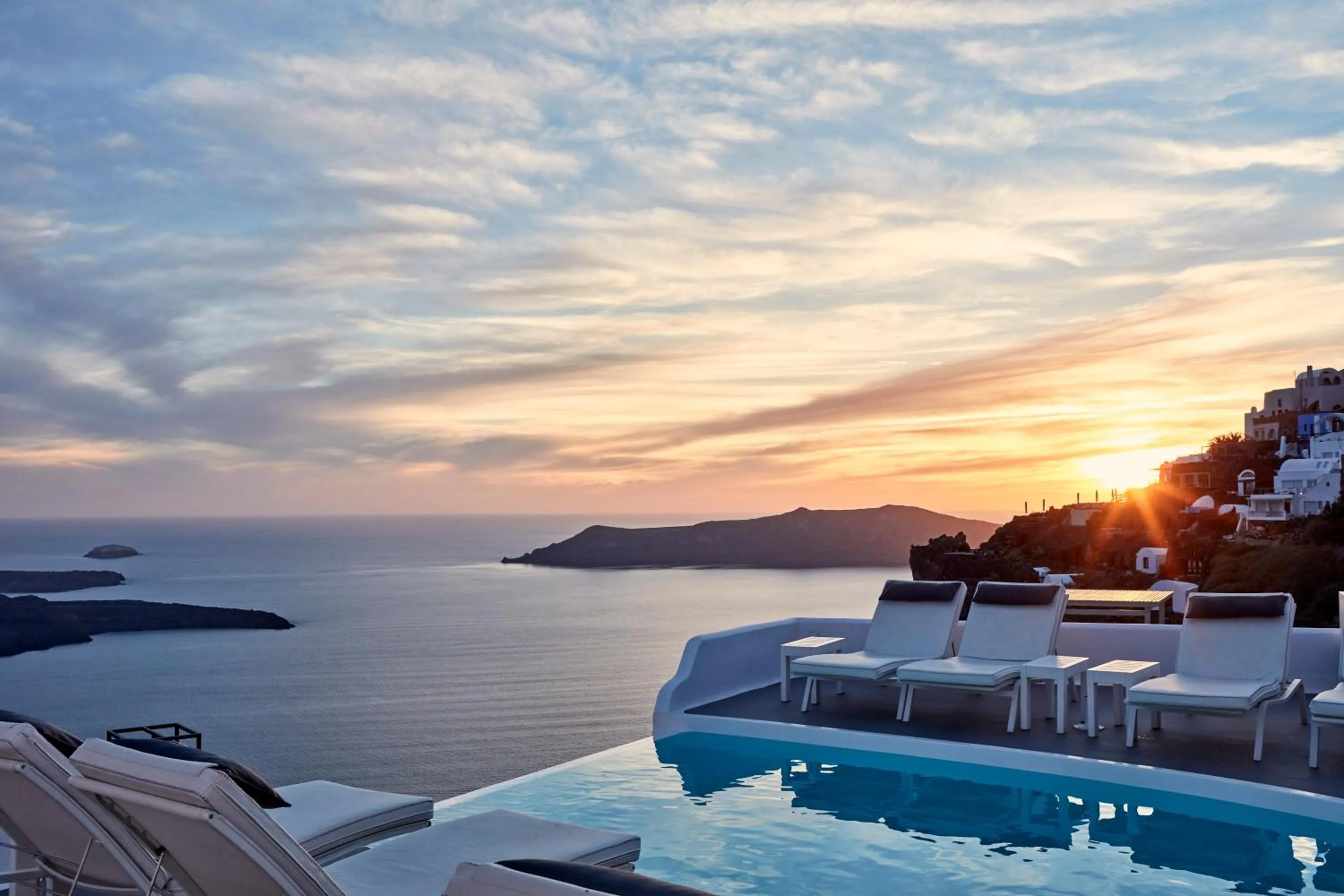 Pool view in Katikies Chromata Santorini - The Leading Hotels of the World