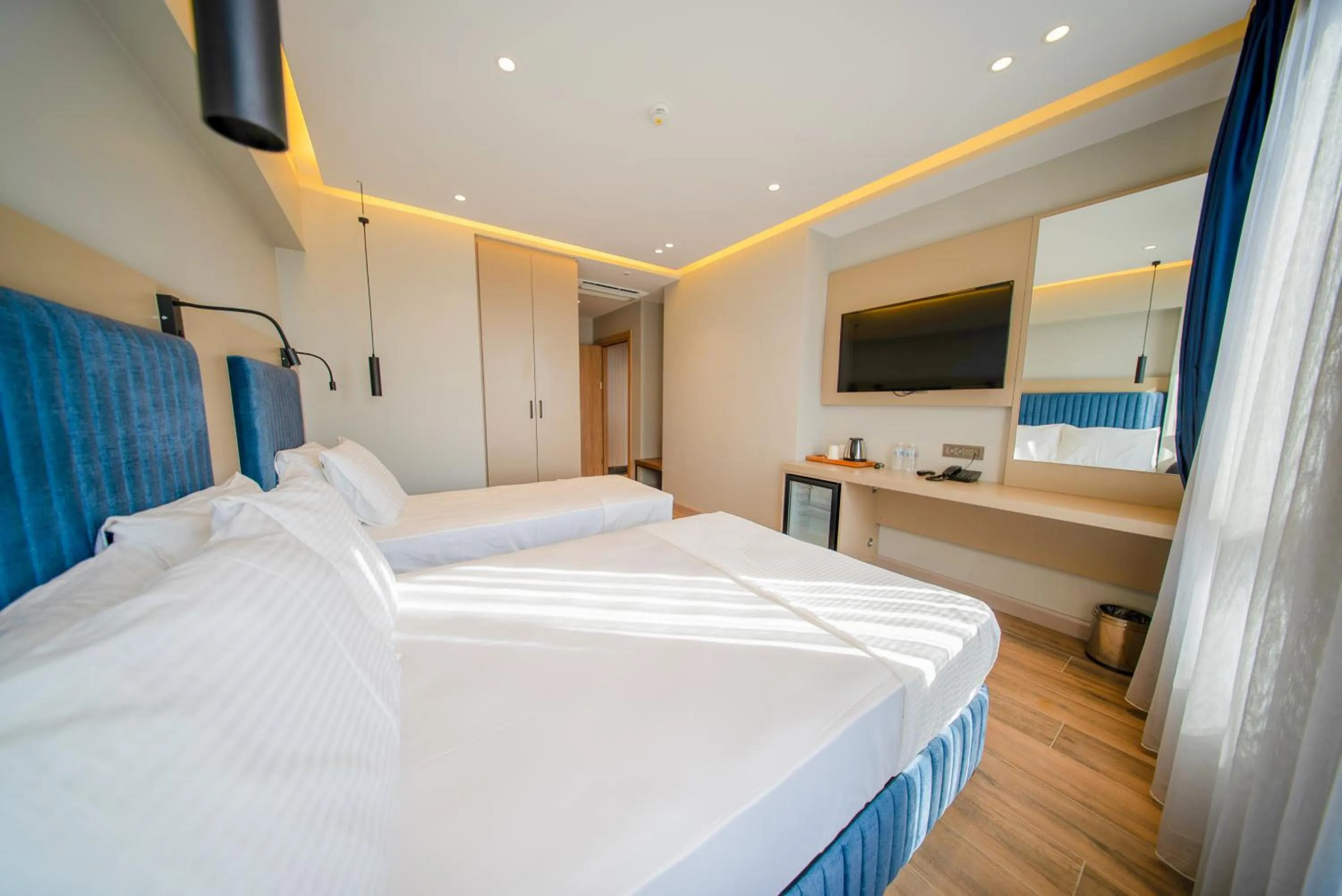 Bed in The Palm Bosphorus Hotel