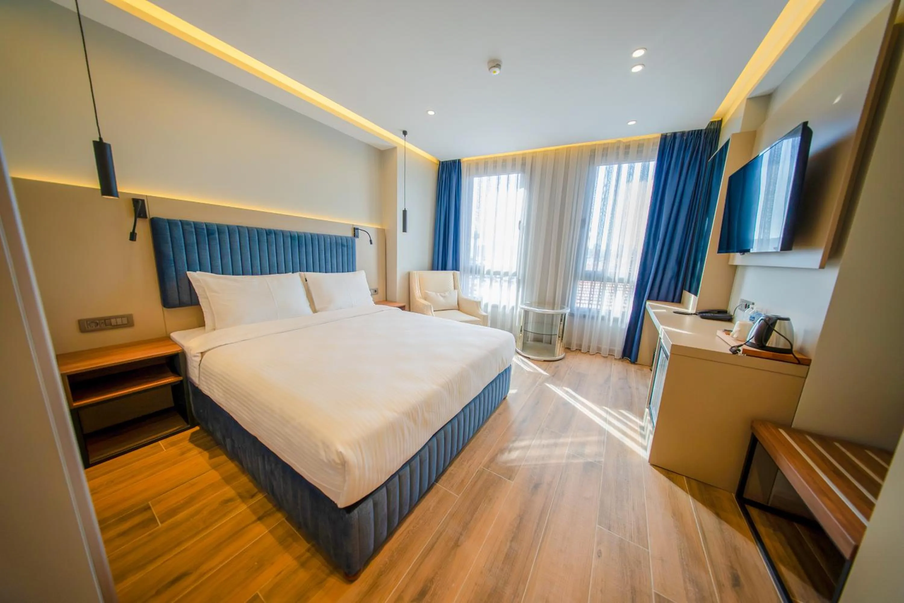 Bed in The Palm Bosphorus Hotel