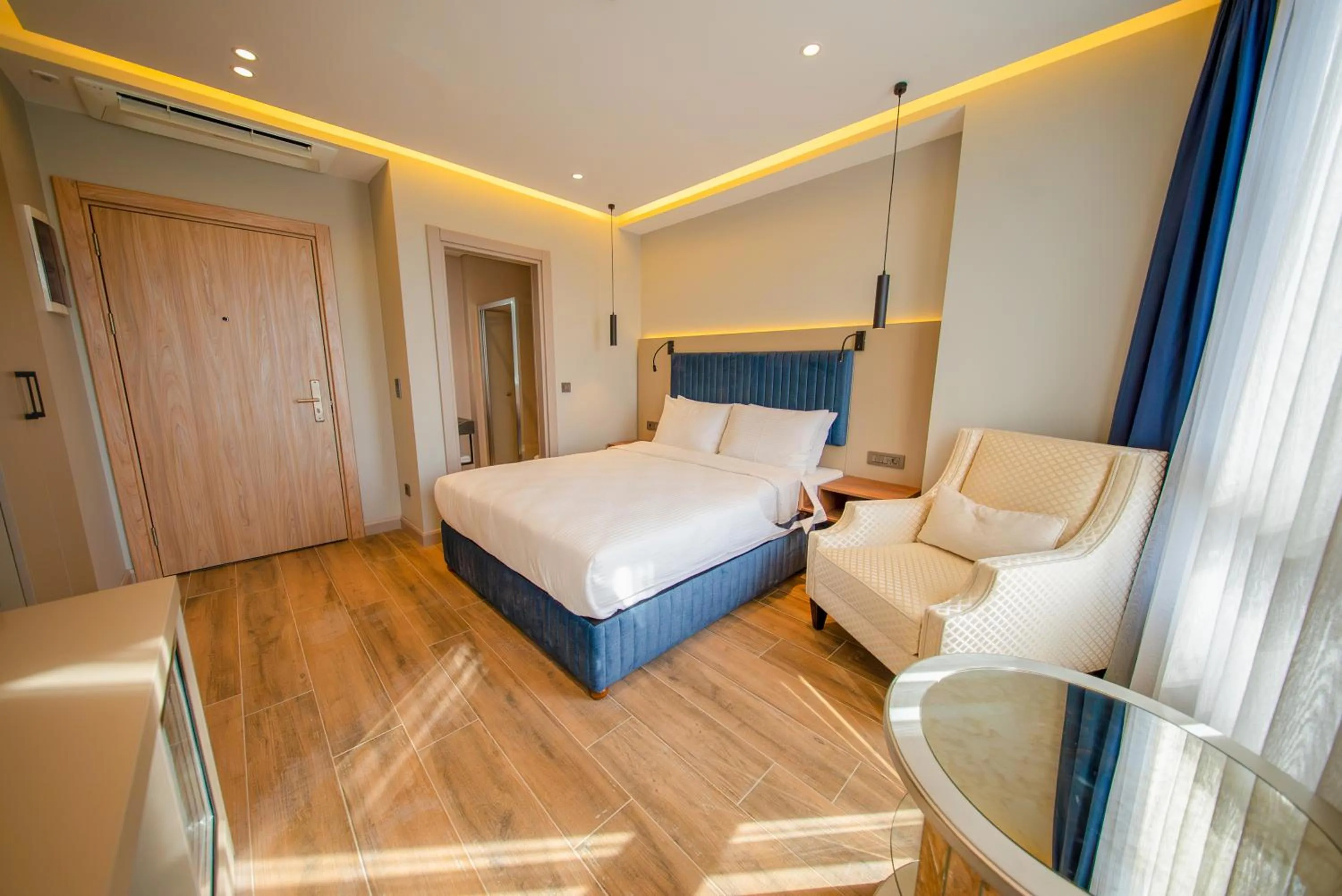 Bed in The Palm Bosphorus Hotel