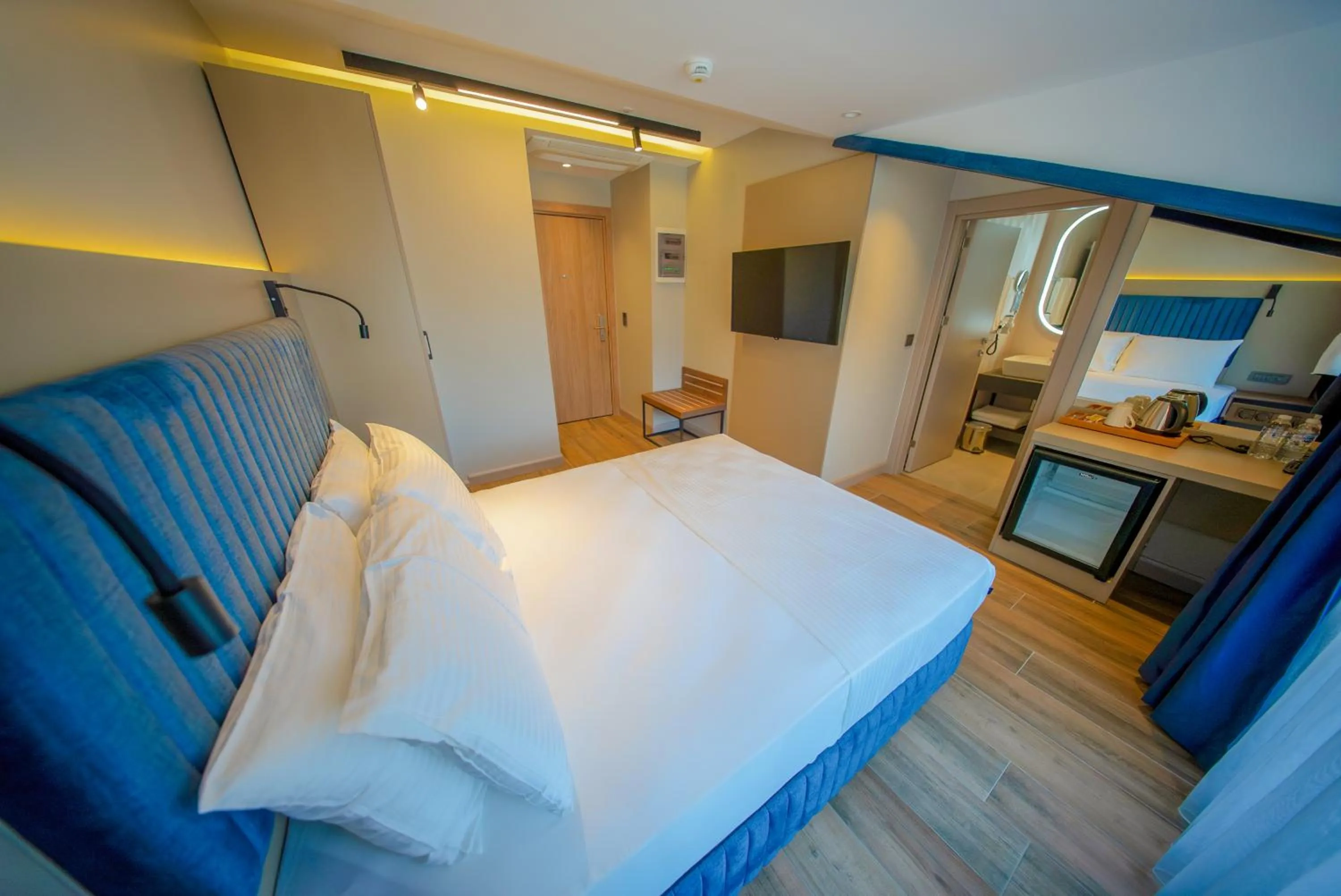 Bed in The Palm Bosphorus Hotel