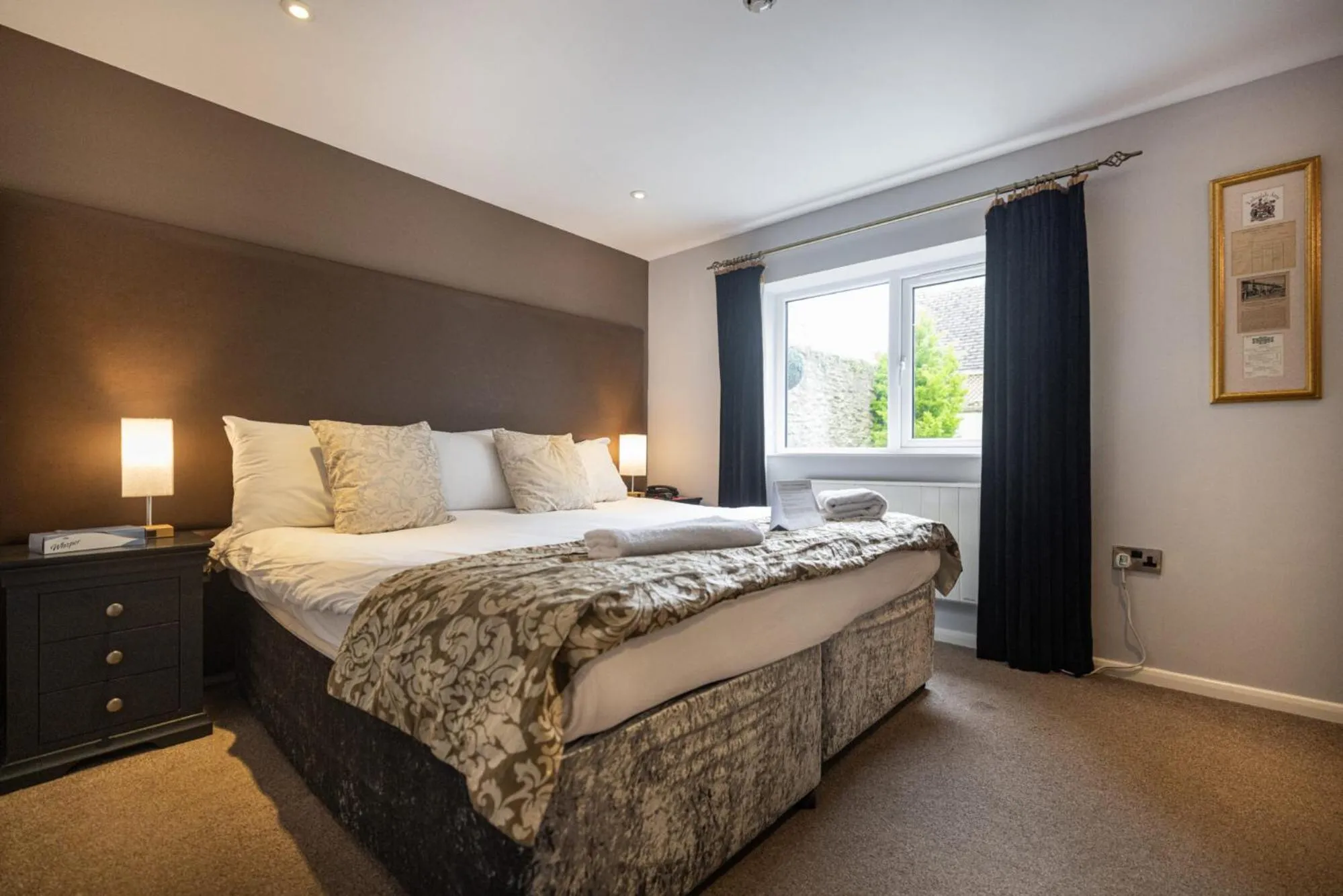 Bed in Redesdale Arms Hotel