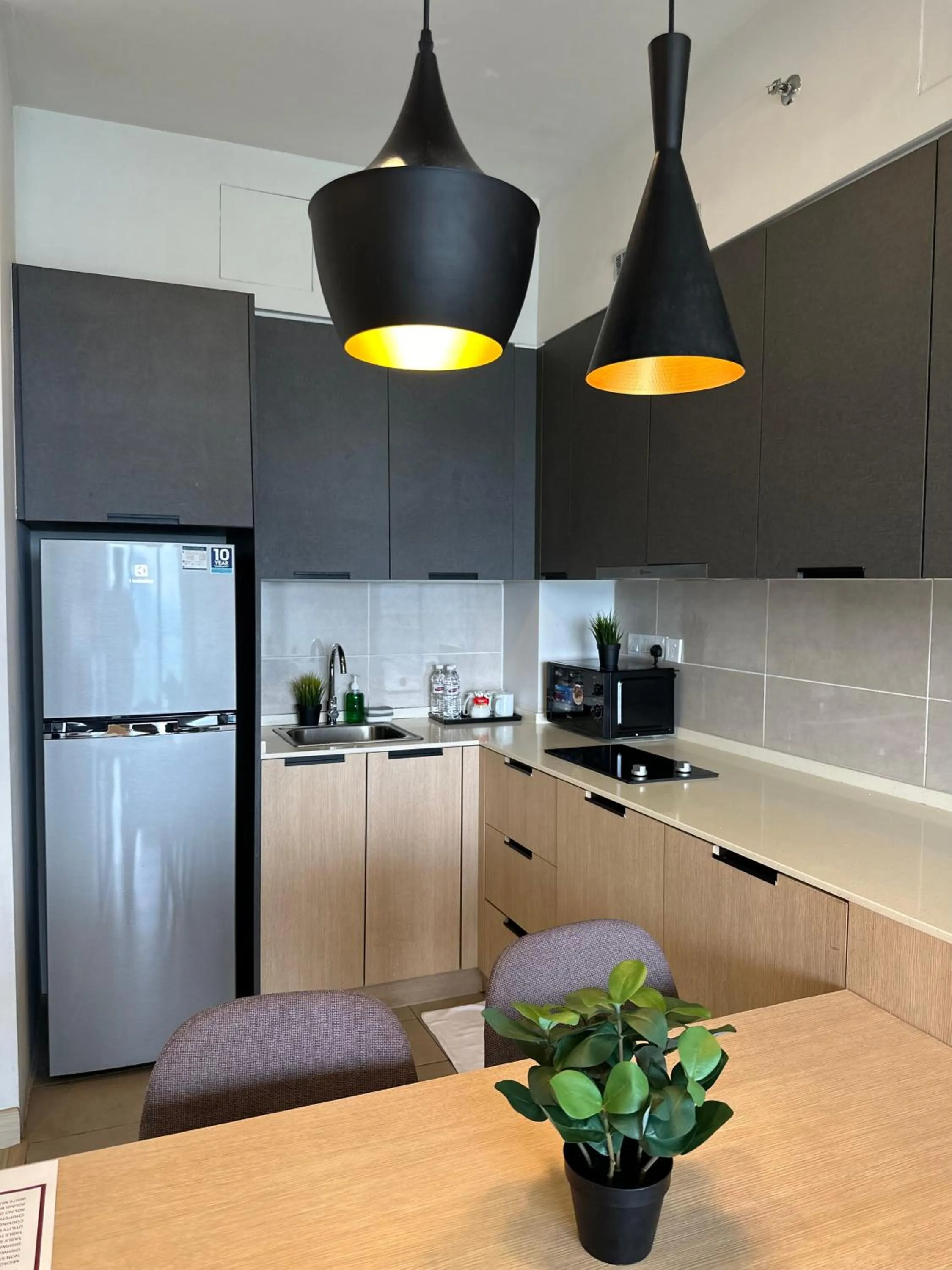 Kitchen or kitchenette in Genting Windmill Homestay