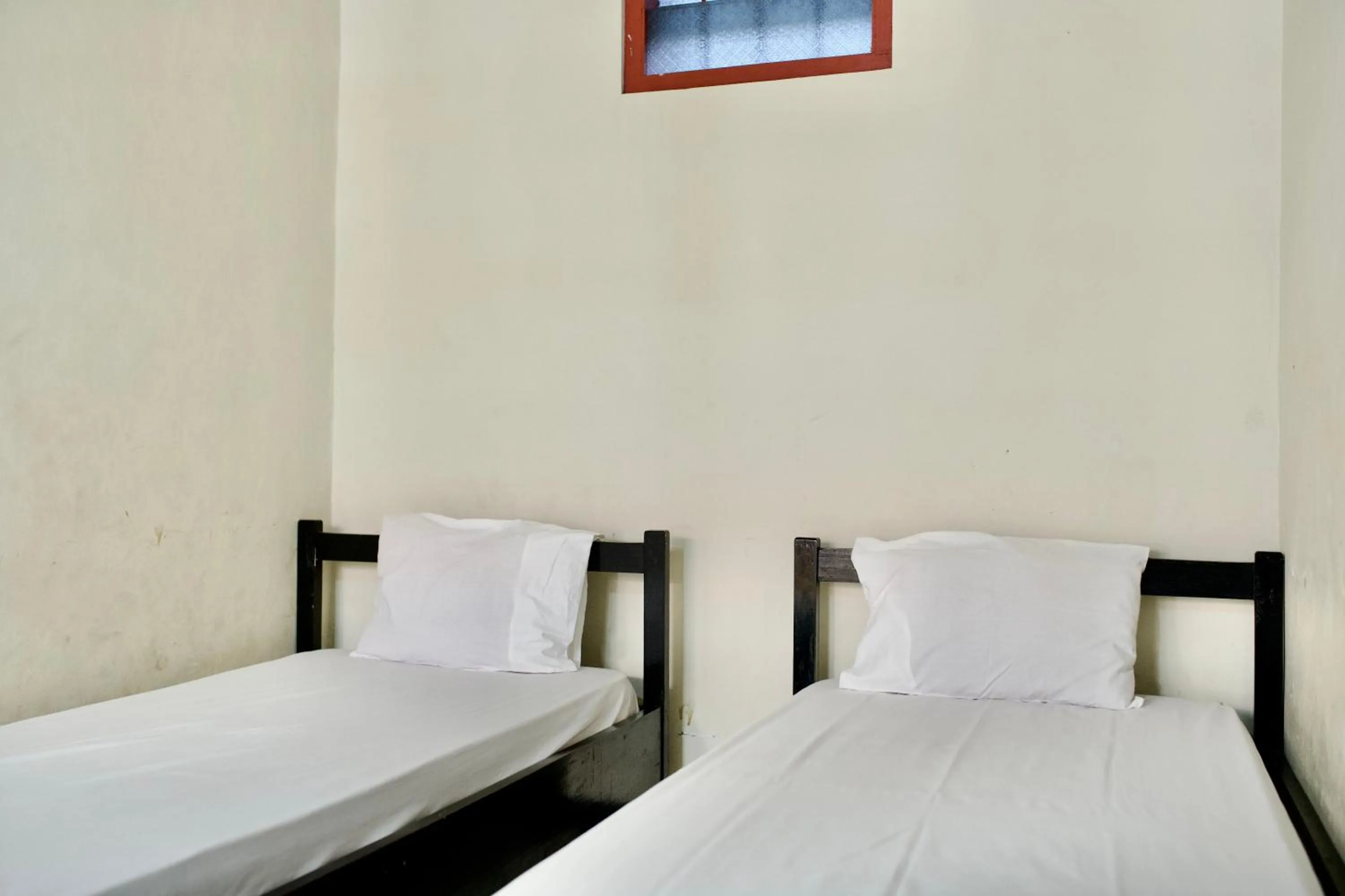 Bed in Garuda Setia Hotel