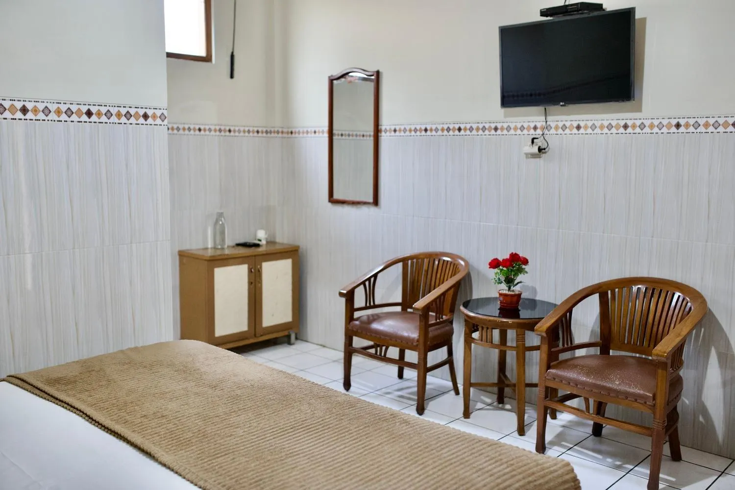 Bed in Garuda Setia Hotel