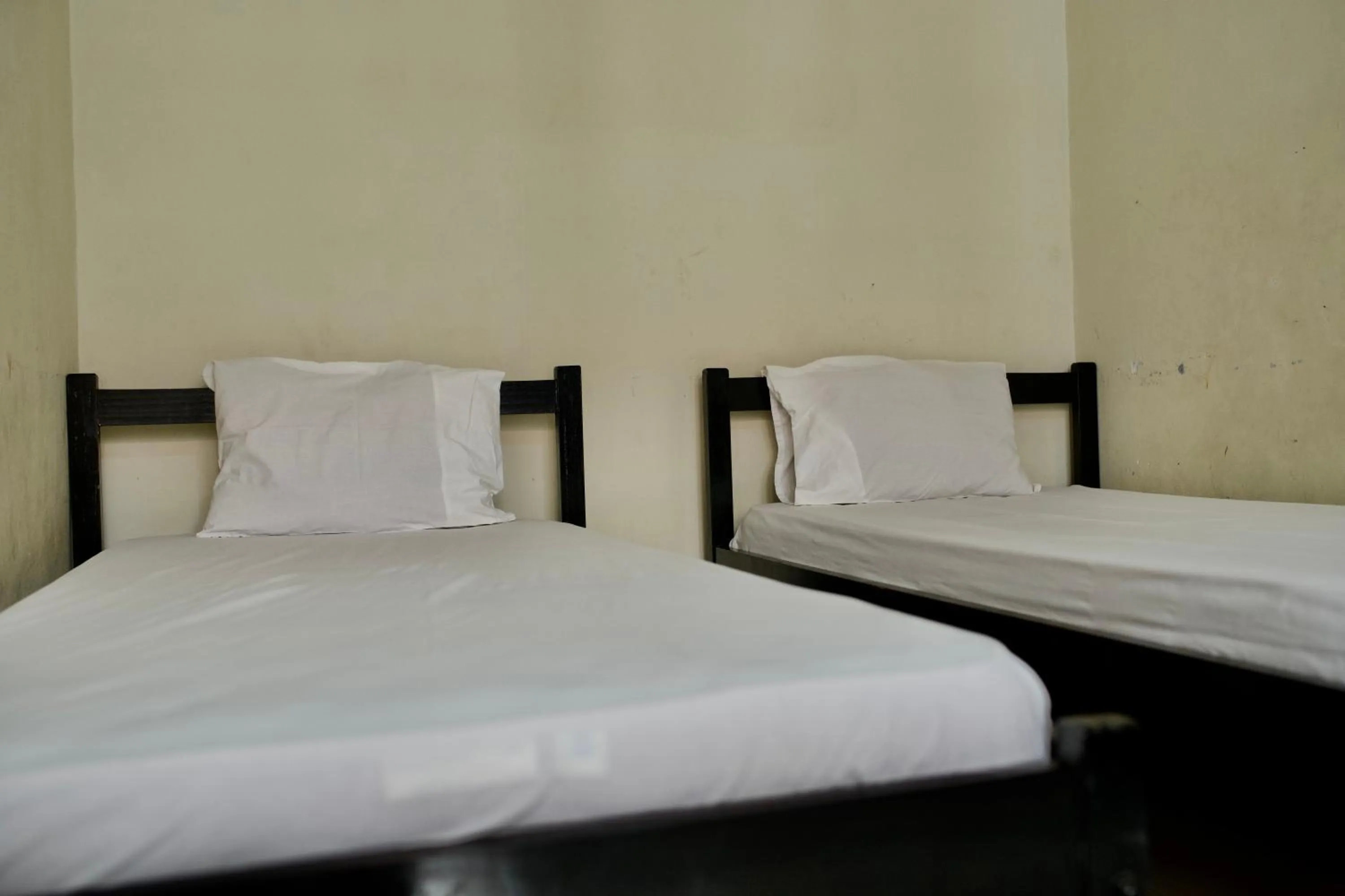 Bed in Garuda Setia Hotel