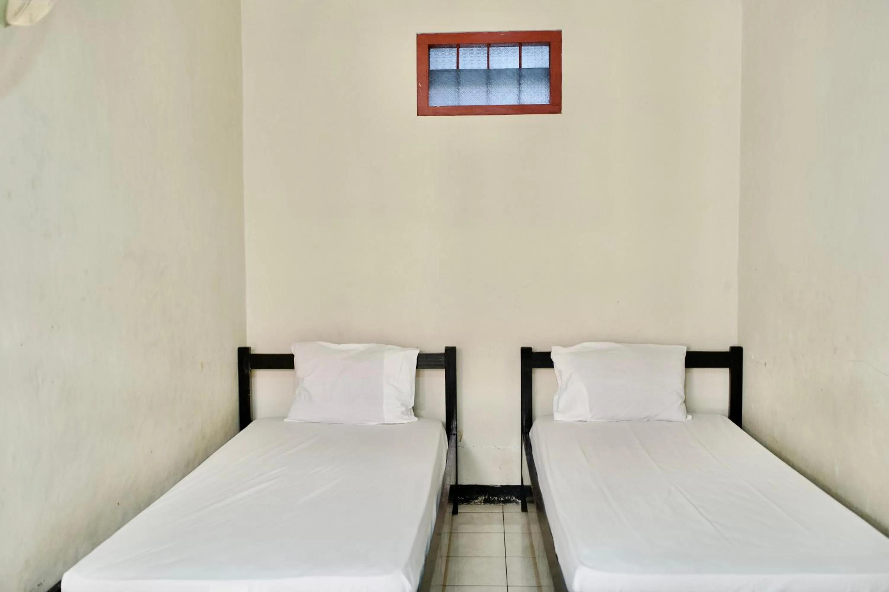 Bed in Garuda Setia Hotel