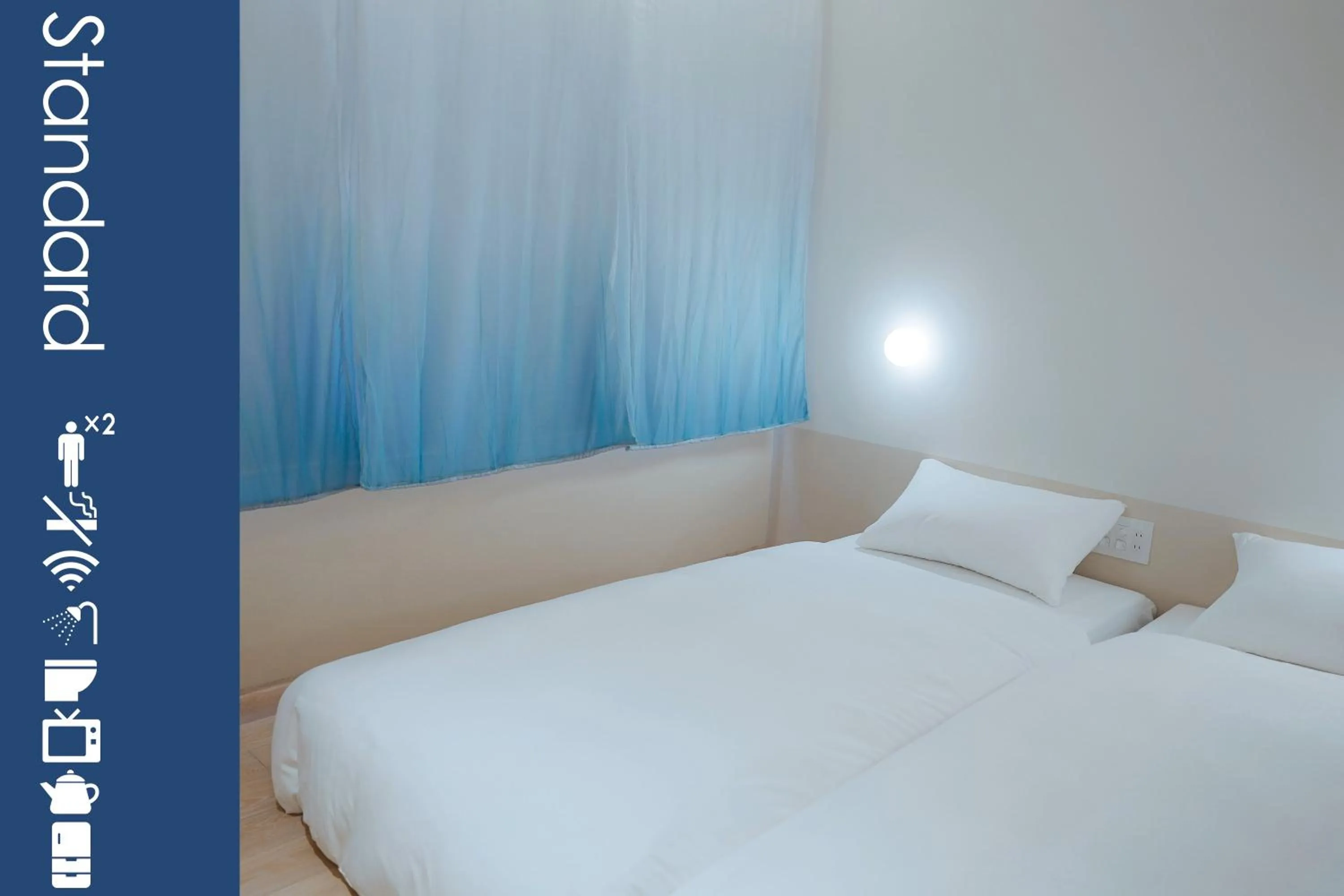 Photo of the whole room, Bed in SEKAI HOTEL Takaoka