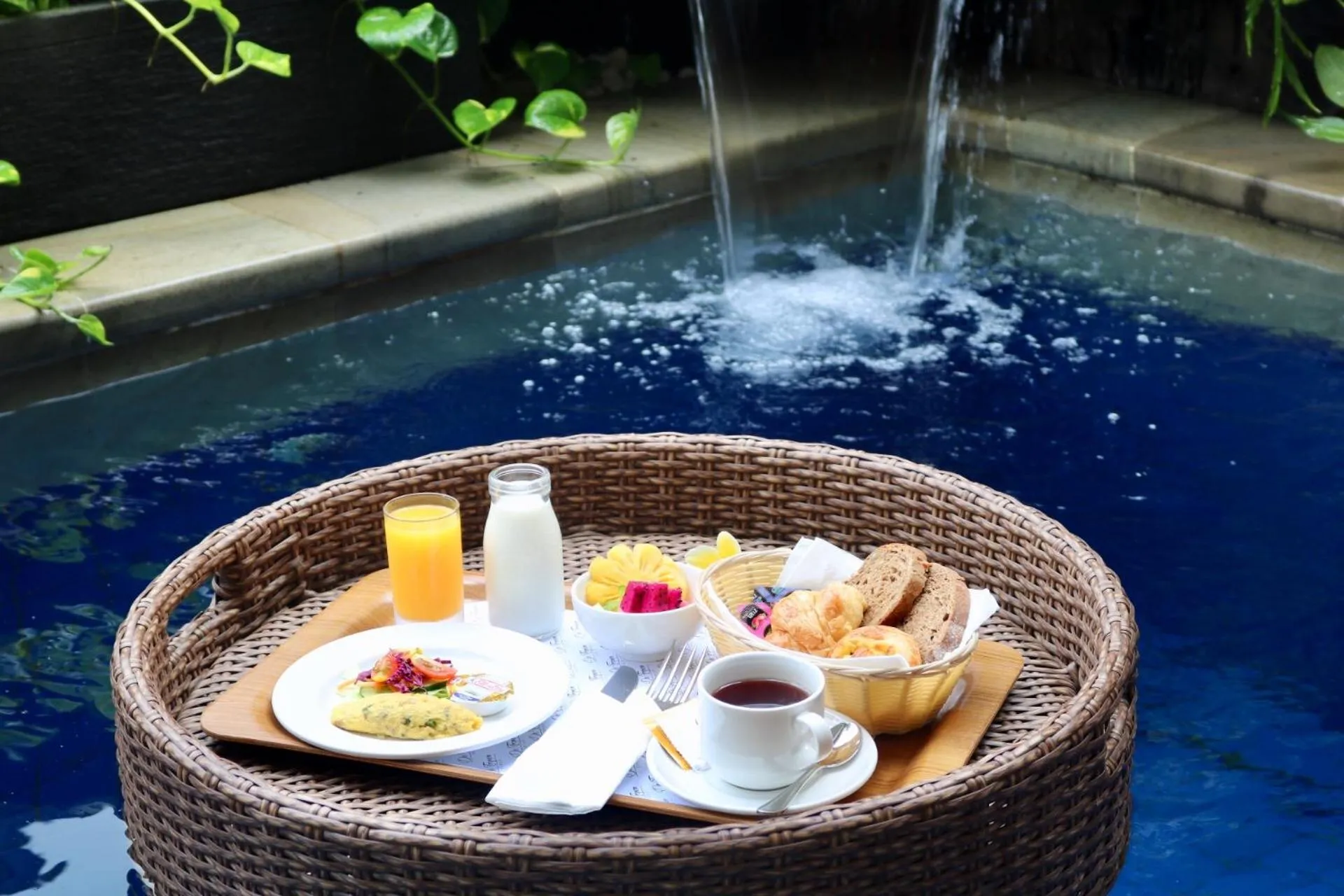 Swimming pool in De Tropen Jogja Villa