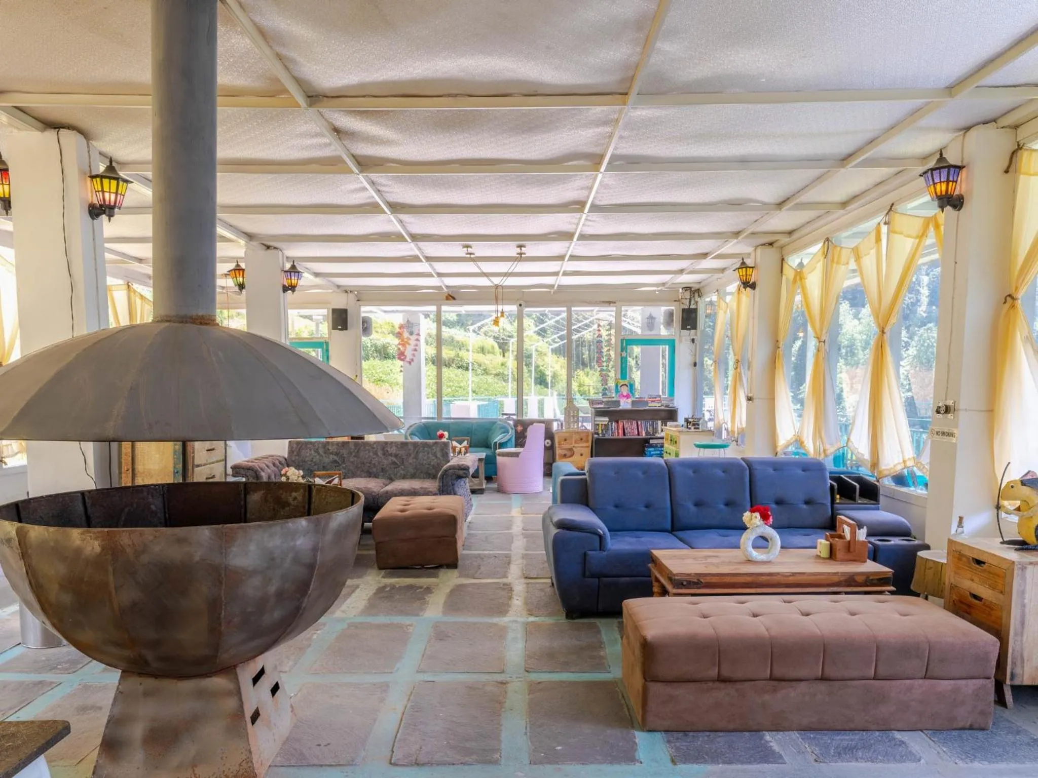 Seating area in Moustache Shoja, Jibhi