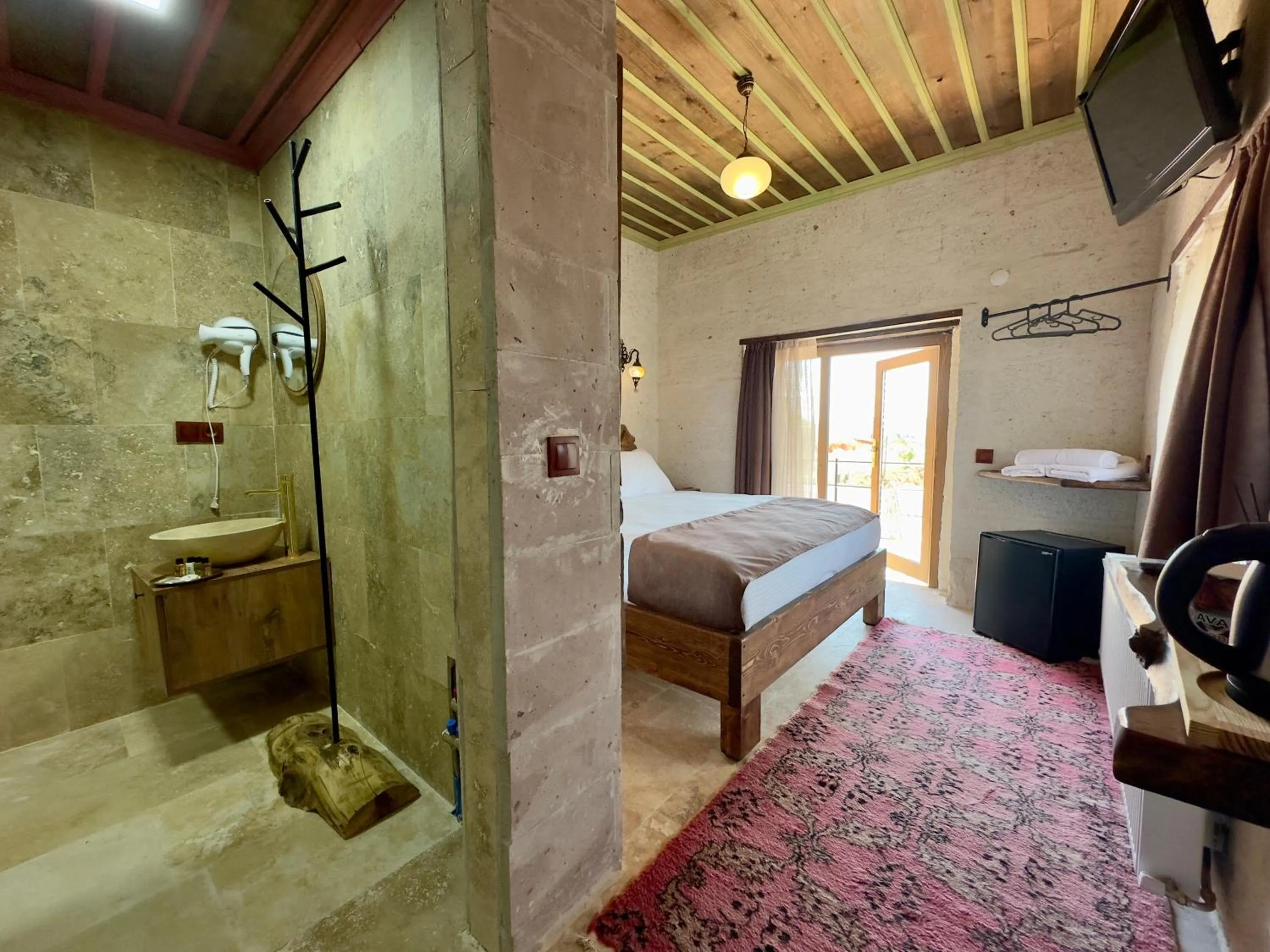 Bathroom, Bed in Almula Cave