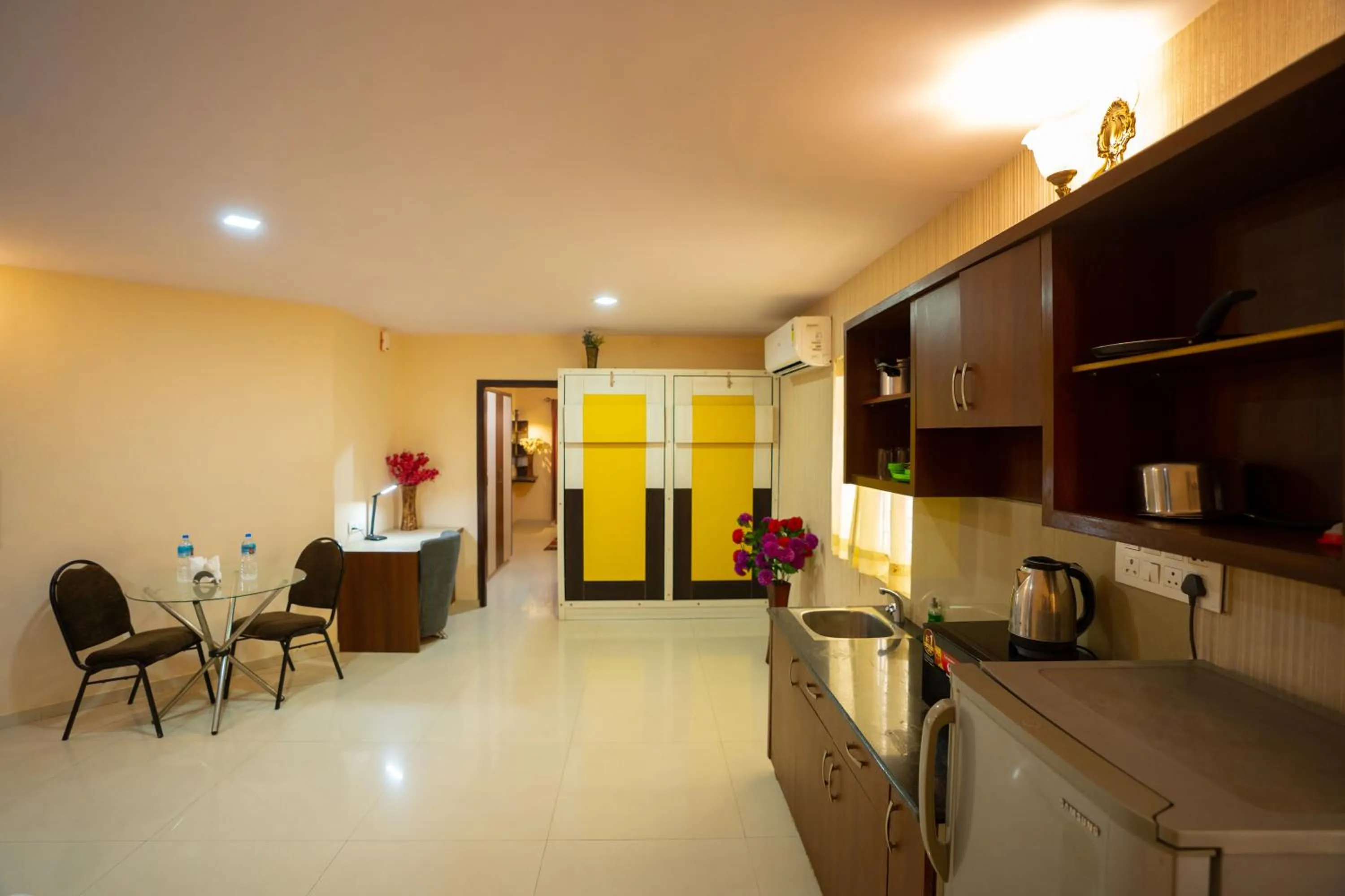 Kitchen or kitchenette in Seasons Suites Koramangala