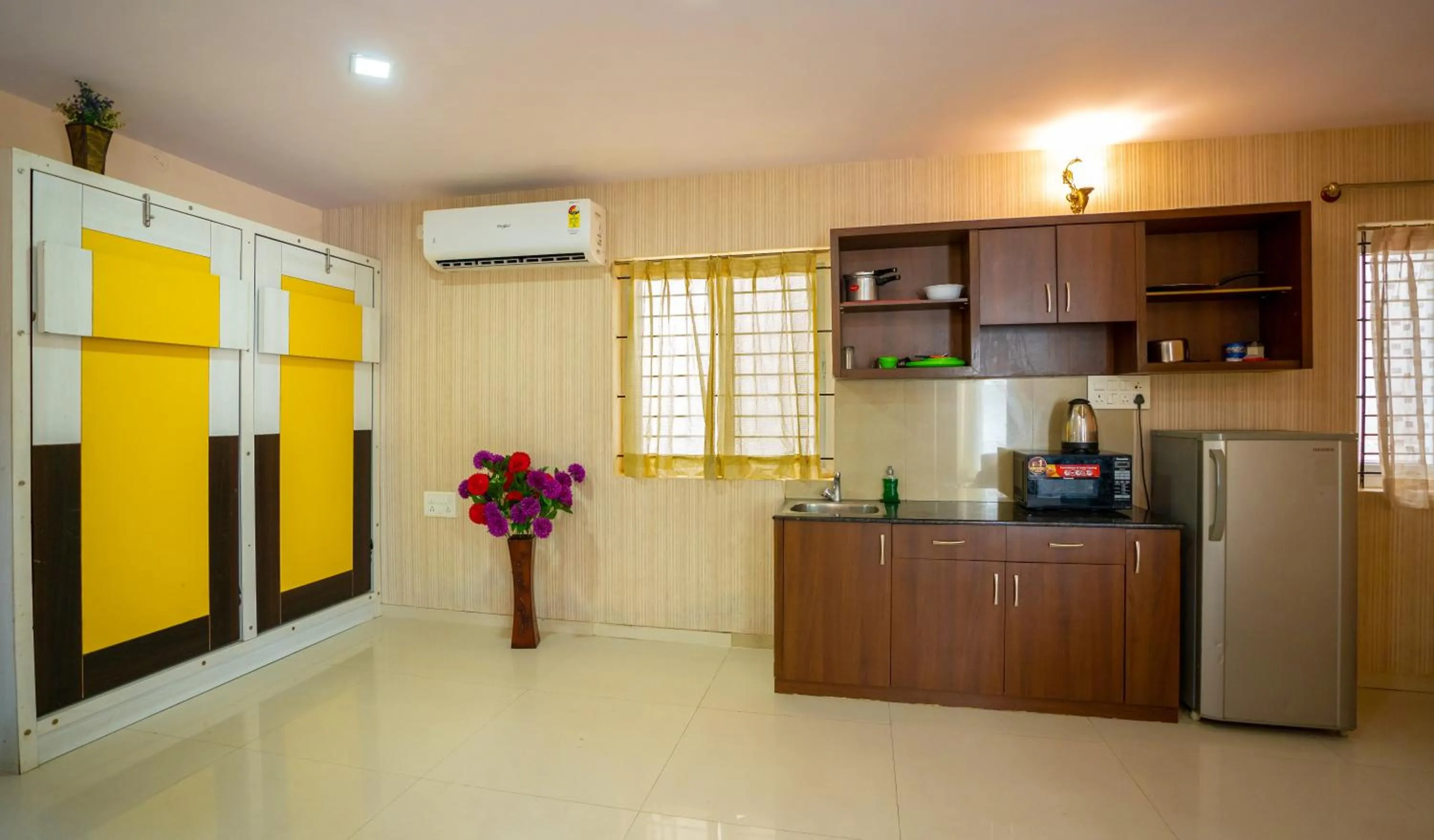Kitchen or kitchenette in Seasons Suites Koramangala