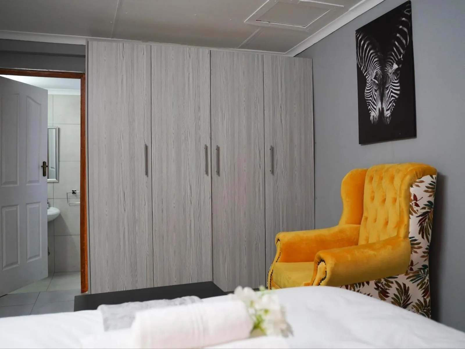 Seating area, Bed in Aqua Guest House