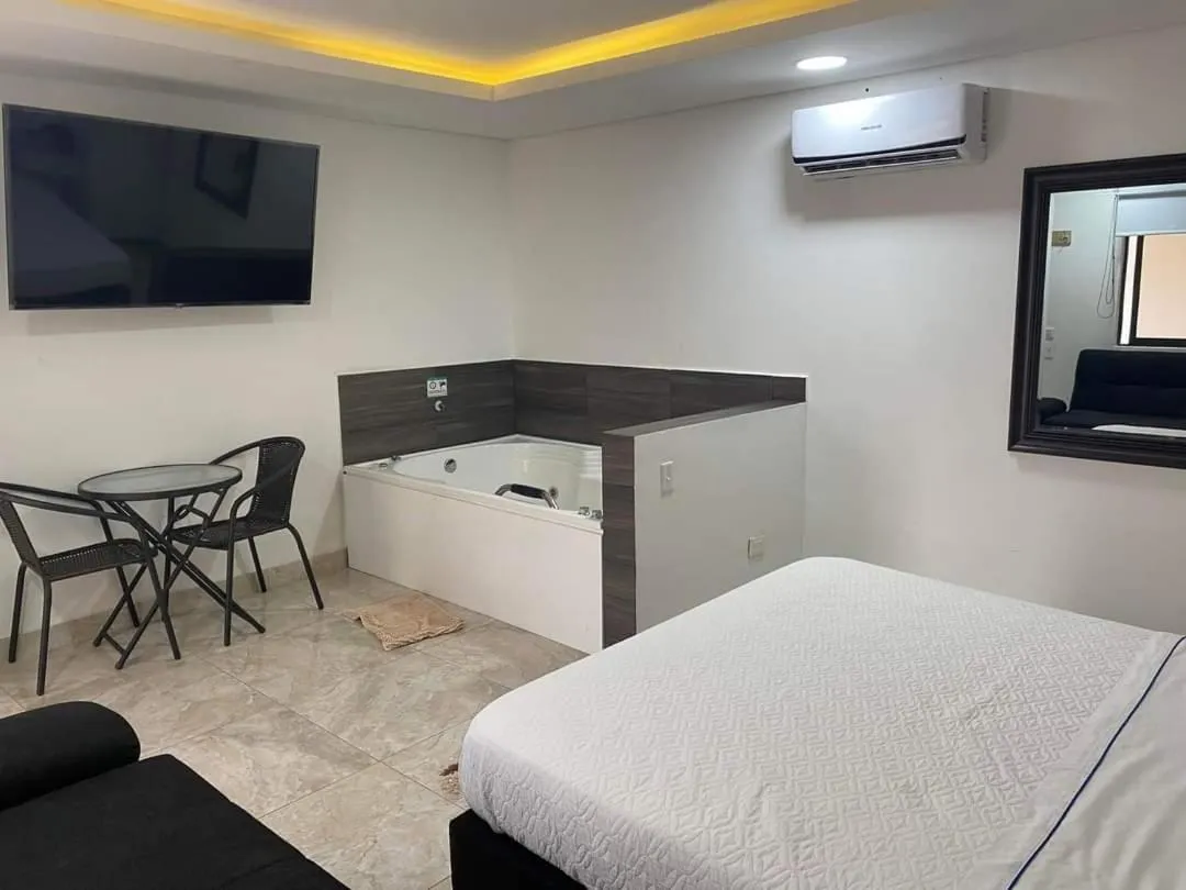 Bed in Hotel deluxe oasis de la colina boutique