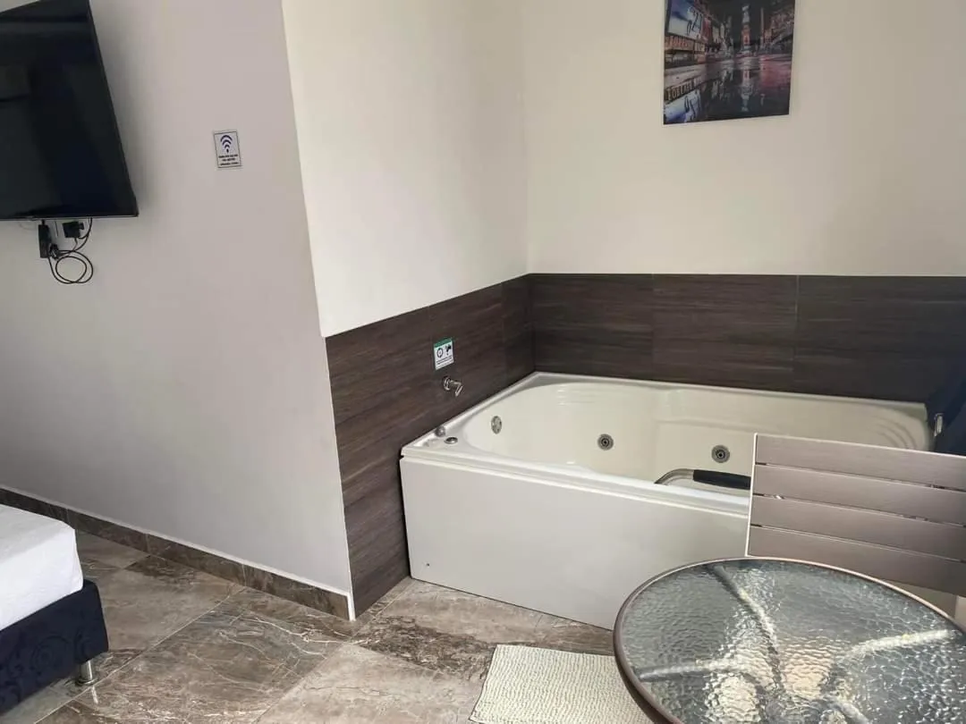 Bed in Hotel deluxe oasis de la colina boutique