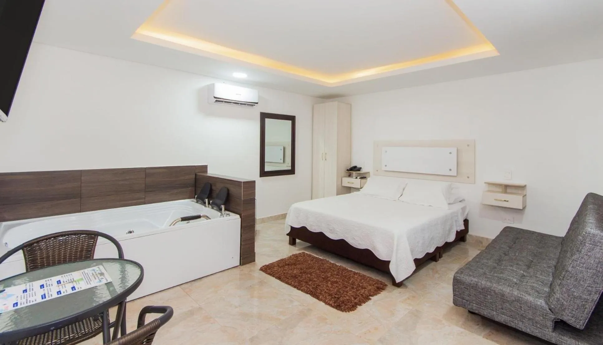 Bed in Hotel deluxe oasis de la colina boutique