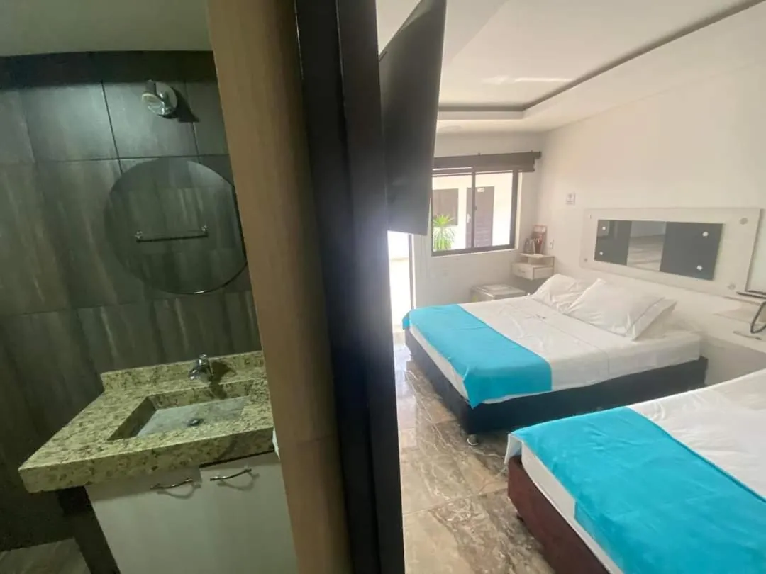 Bed in Hotel deluxe oasis de la colina boutique