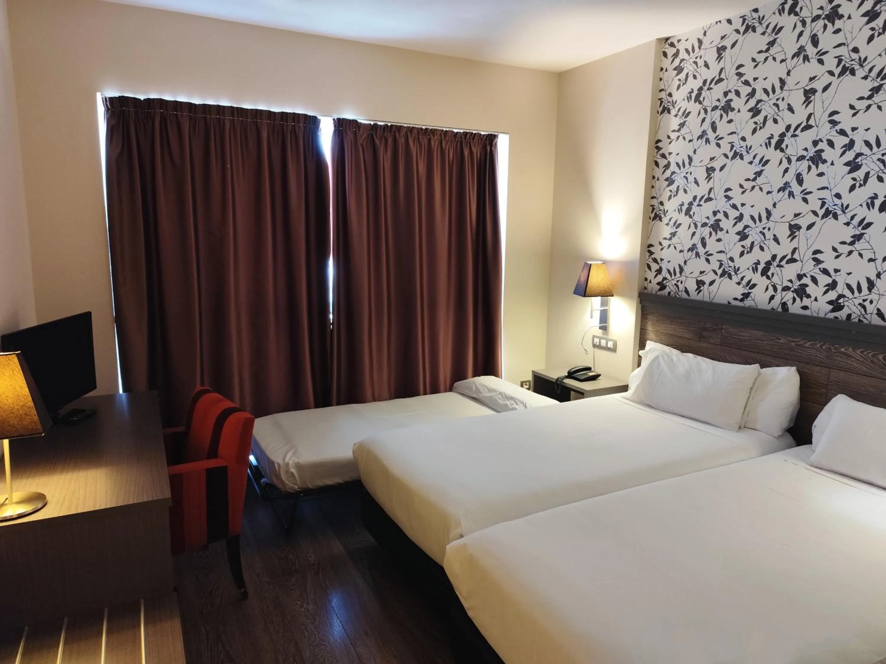 Bed in Sercotel Plaza Feria