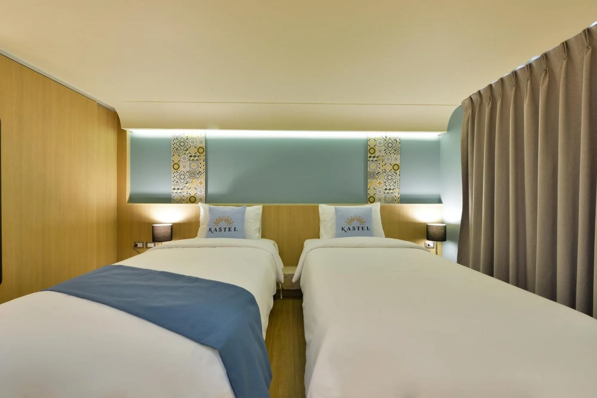 Bed in Kastel Bangkok Hotel