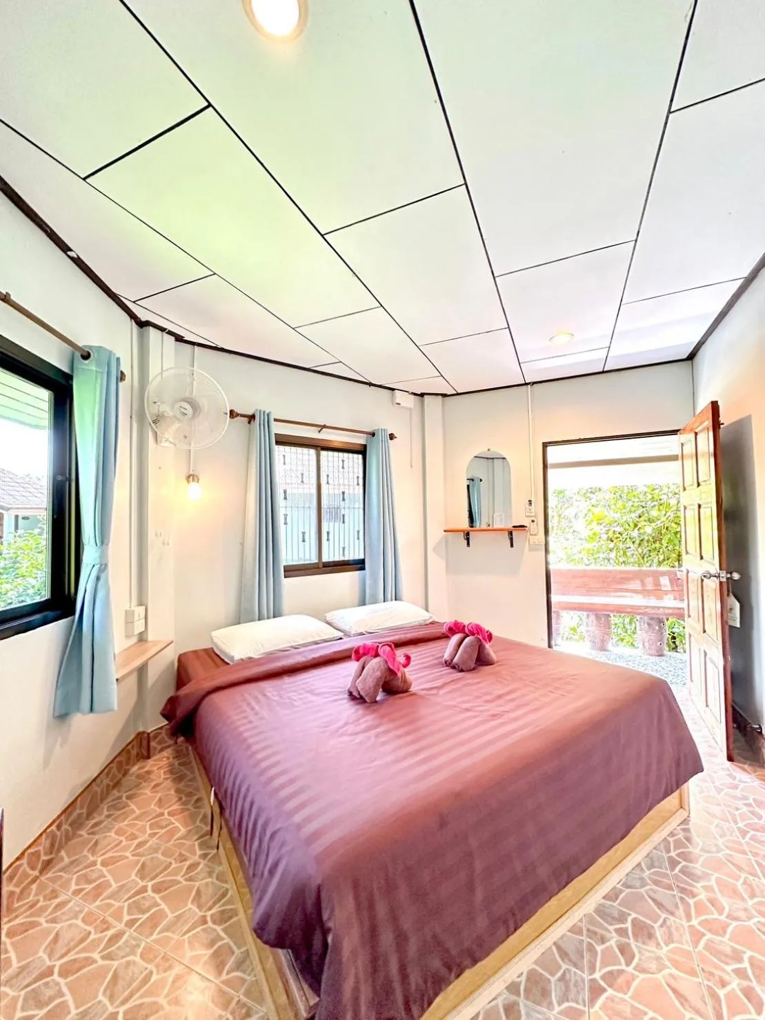 Bed in Khao Sok Jungle Huts Resort