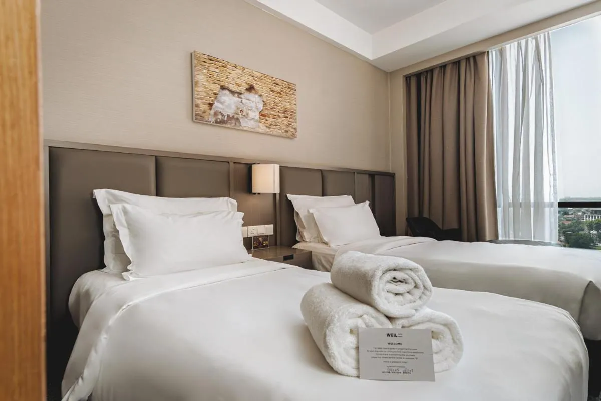 Bed in WEIL Hotel Ipoh