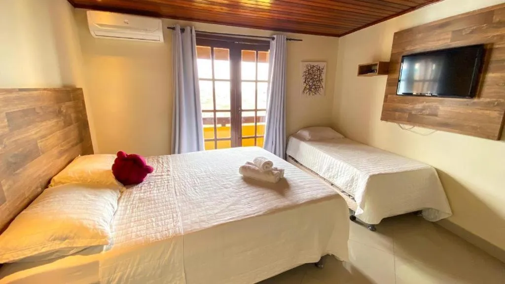 Bedroom in Pousada Dos Atobás