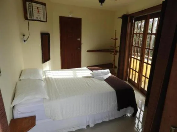 Bedroom in Pousada Dos Atobás