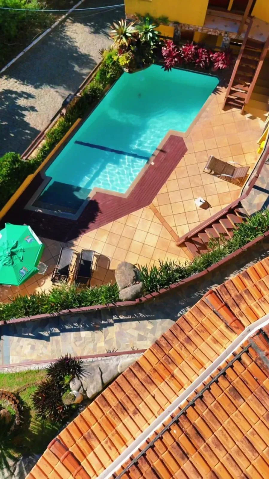 Swimming pool in Pousada Dos Atobás