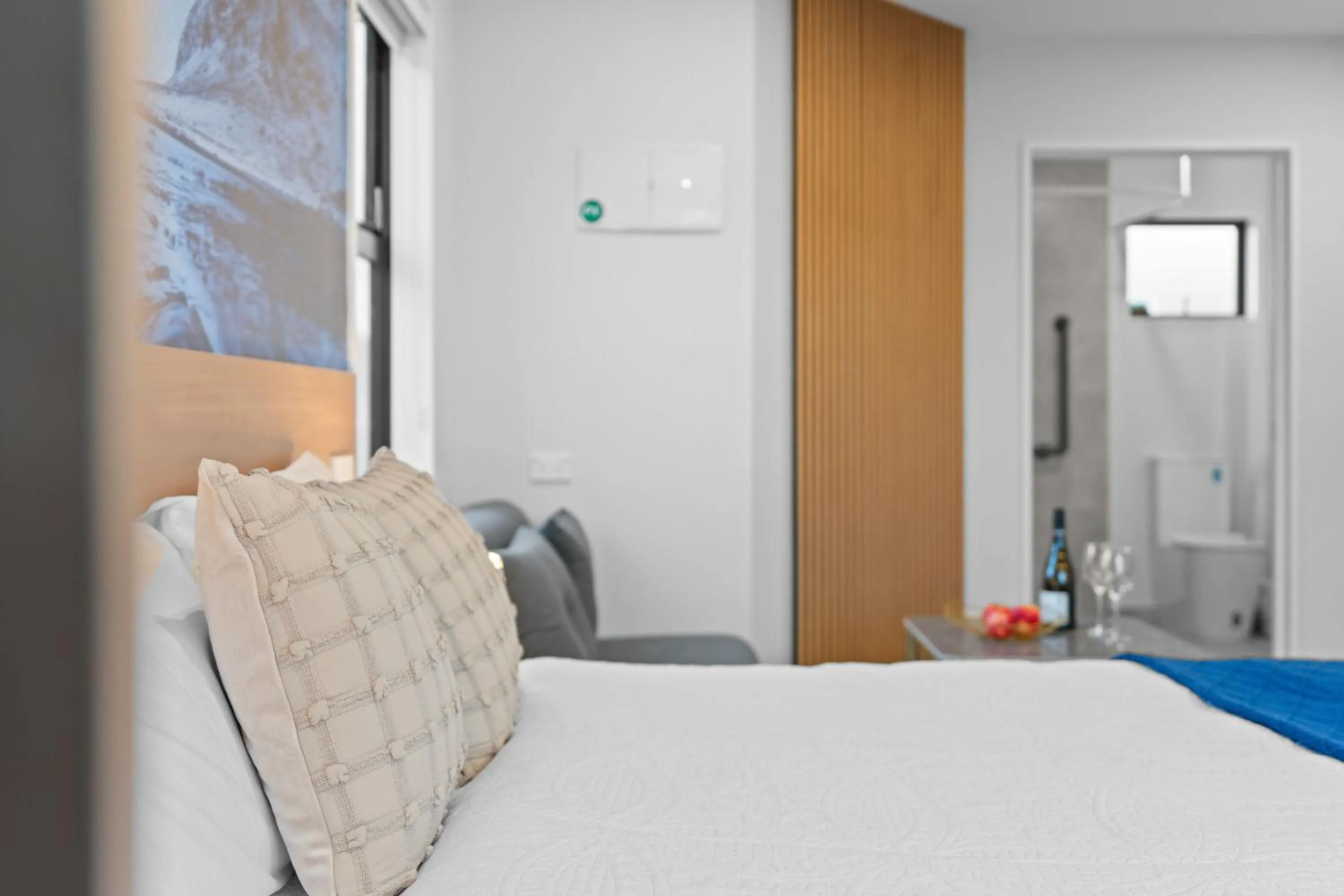 Bed in Sunshine Suites