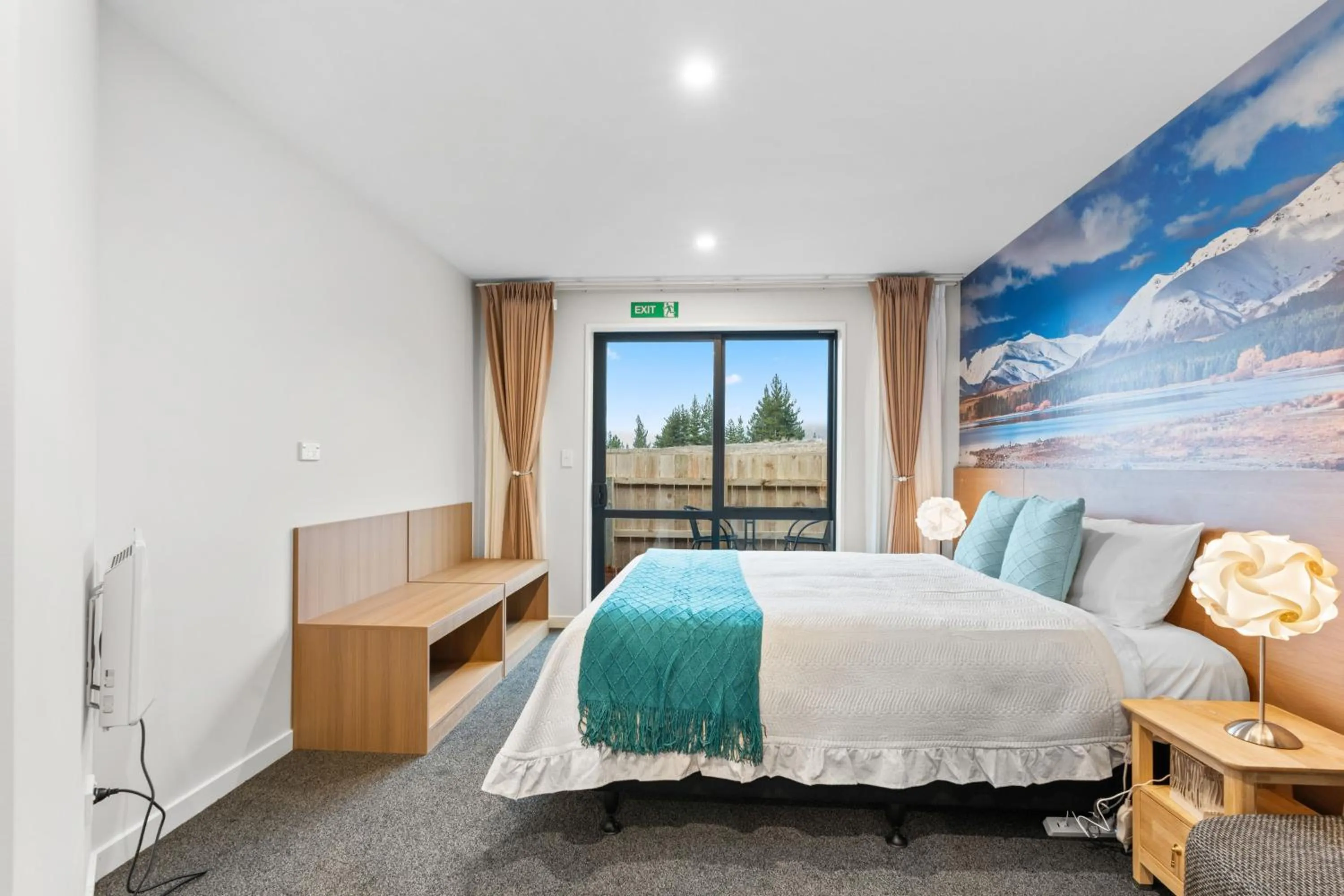 Bed in Sunshine Suites