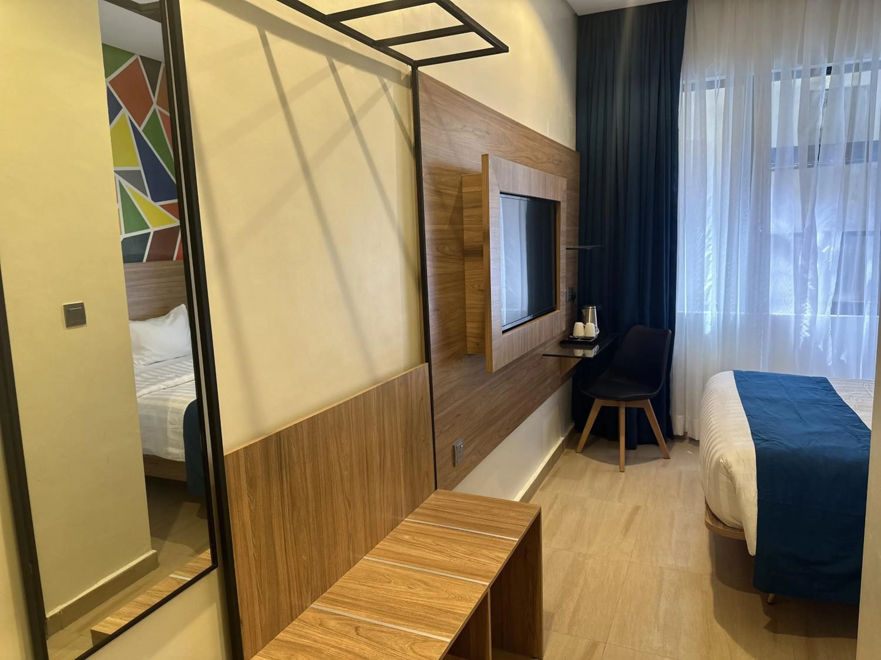 TV and multimedia, Bed in Hotelinn Oniru